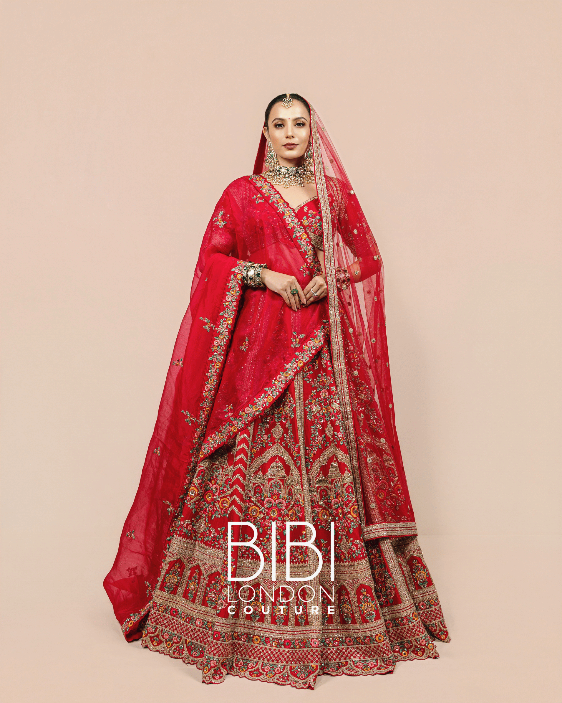 Fuchsia Lehenga with Multicolour Floral Embroidery and Temple Borders