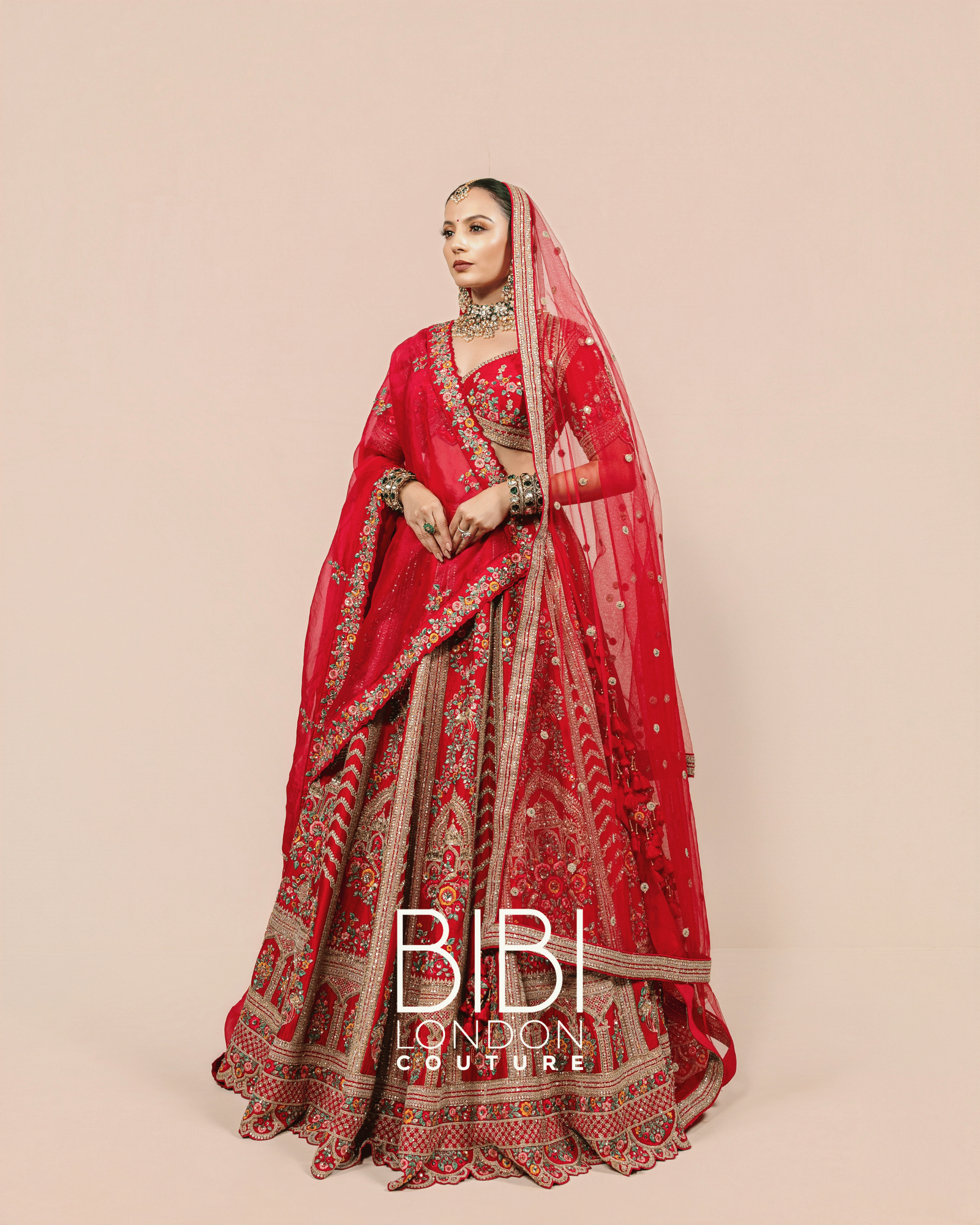 Fuchsia Lehenga with Multicolour Floral Embroidery and Temple Borders