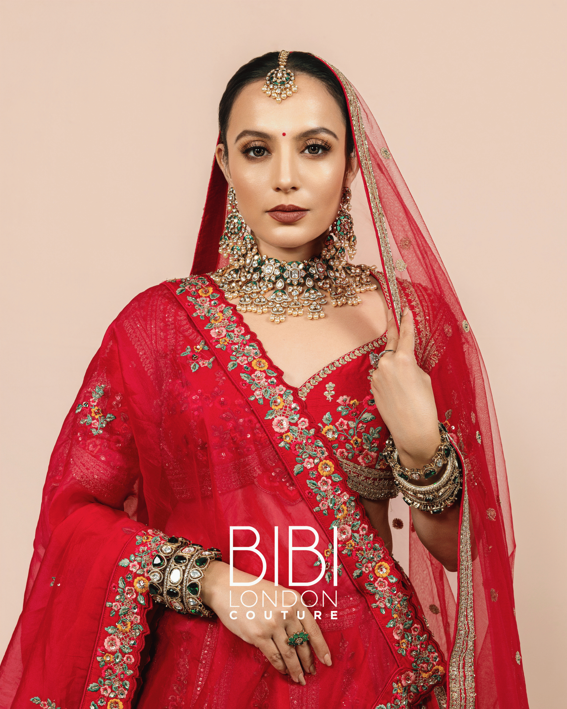 Fuchsia Lehenga with Multicolour Floral Embroidery and Temple Borders