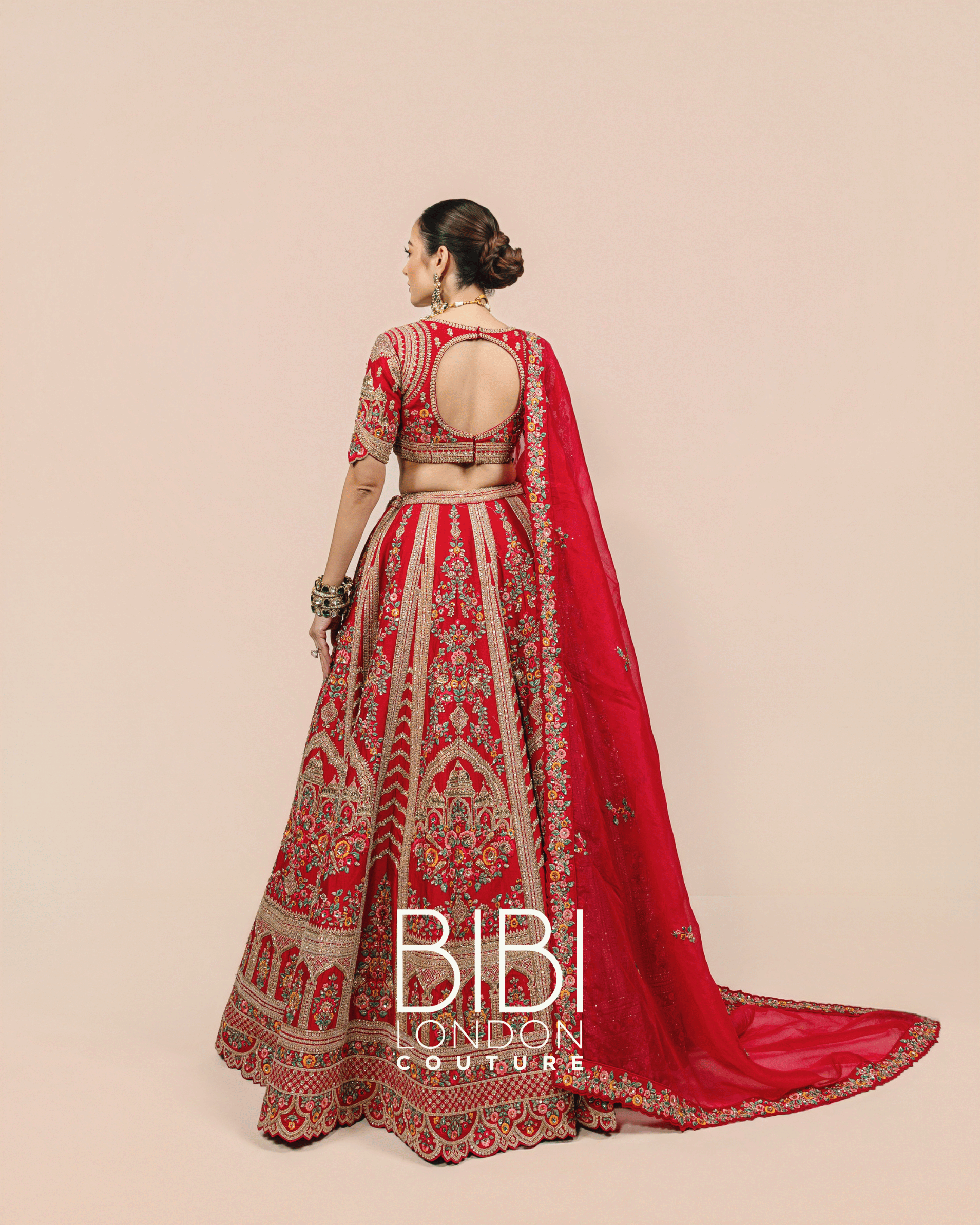 Fuchsia Lehenga with Multicolour Floral Embroidery and Temple Borders