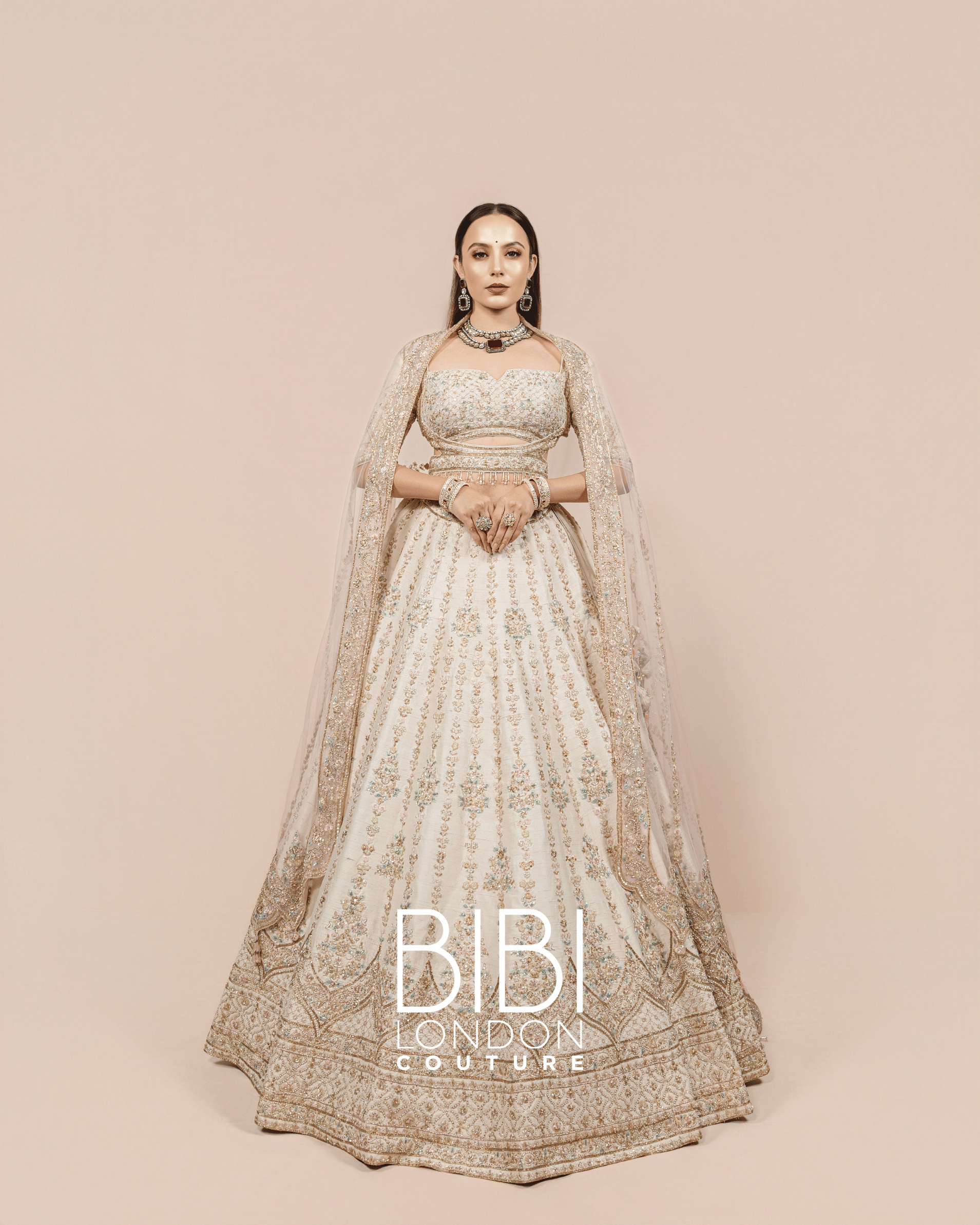 Ivory Lehenga with Silver Zari and Pastel Sequin Embroidery