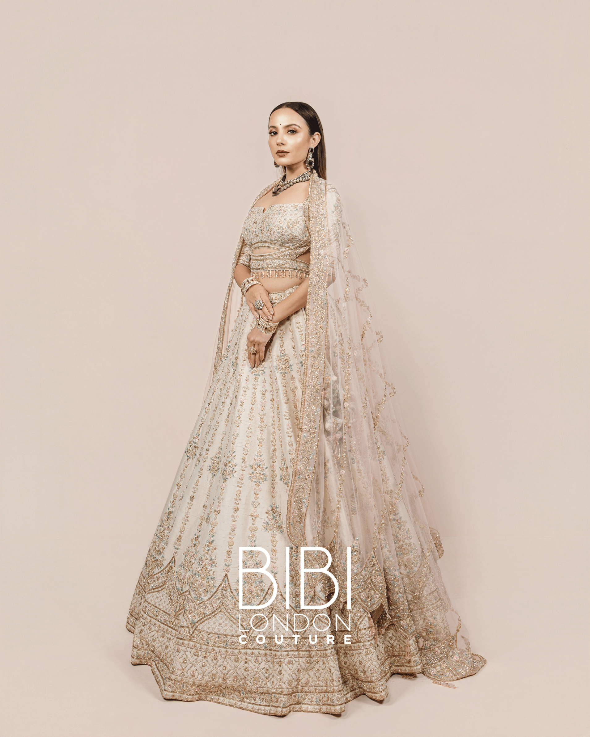 Ivory Lehenga with Silver Zari and Pastel Sequin Embroidery