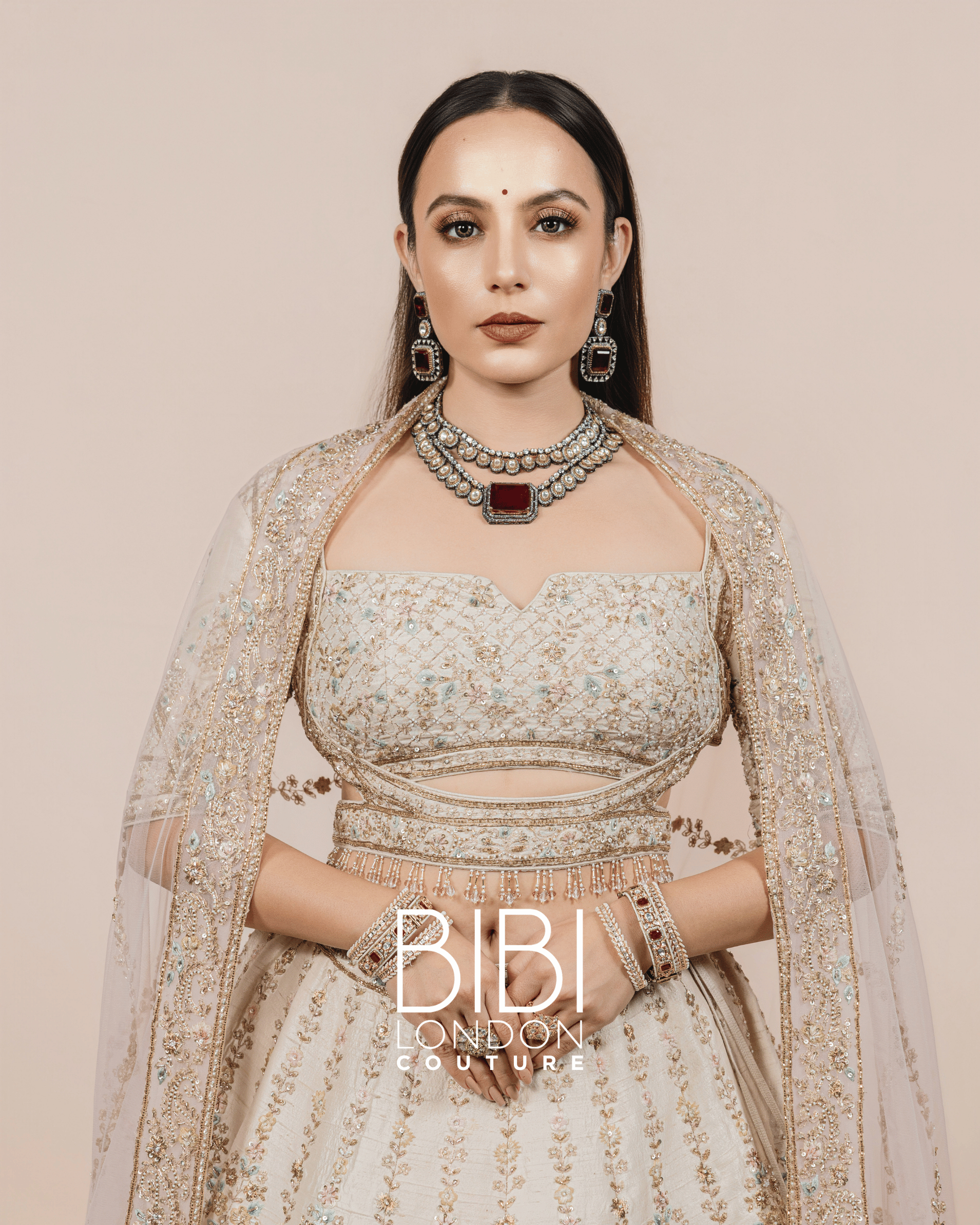 Ivory Lehenga with Silver Zari and Pastel Sequin Embroidery