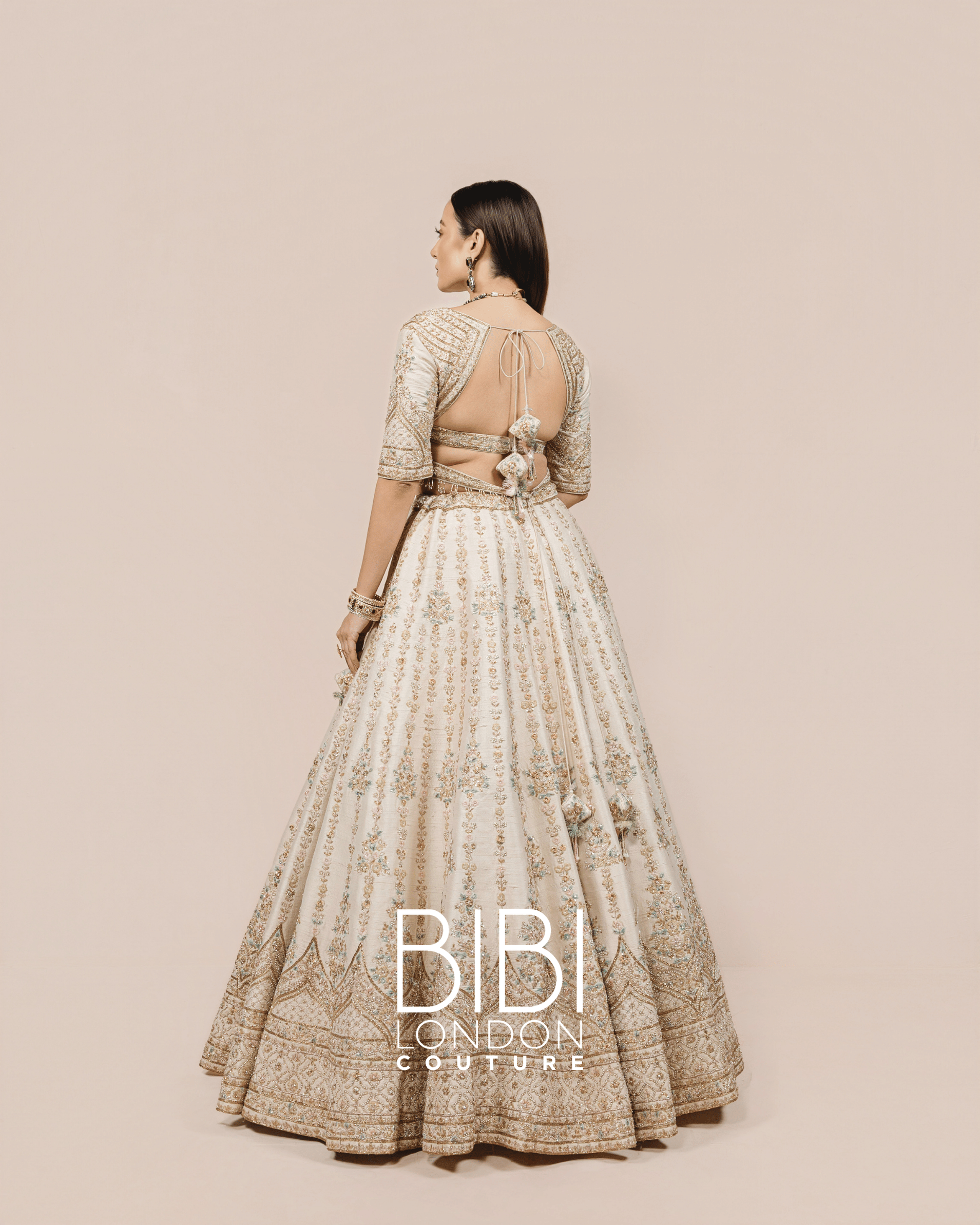 Ivory Lehenga with Silver Zari and Pastel Sequin Embroidery