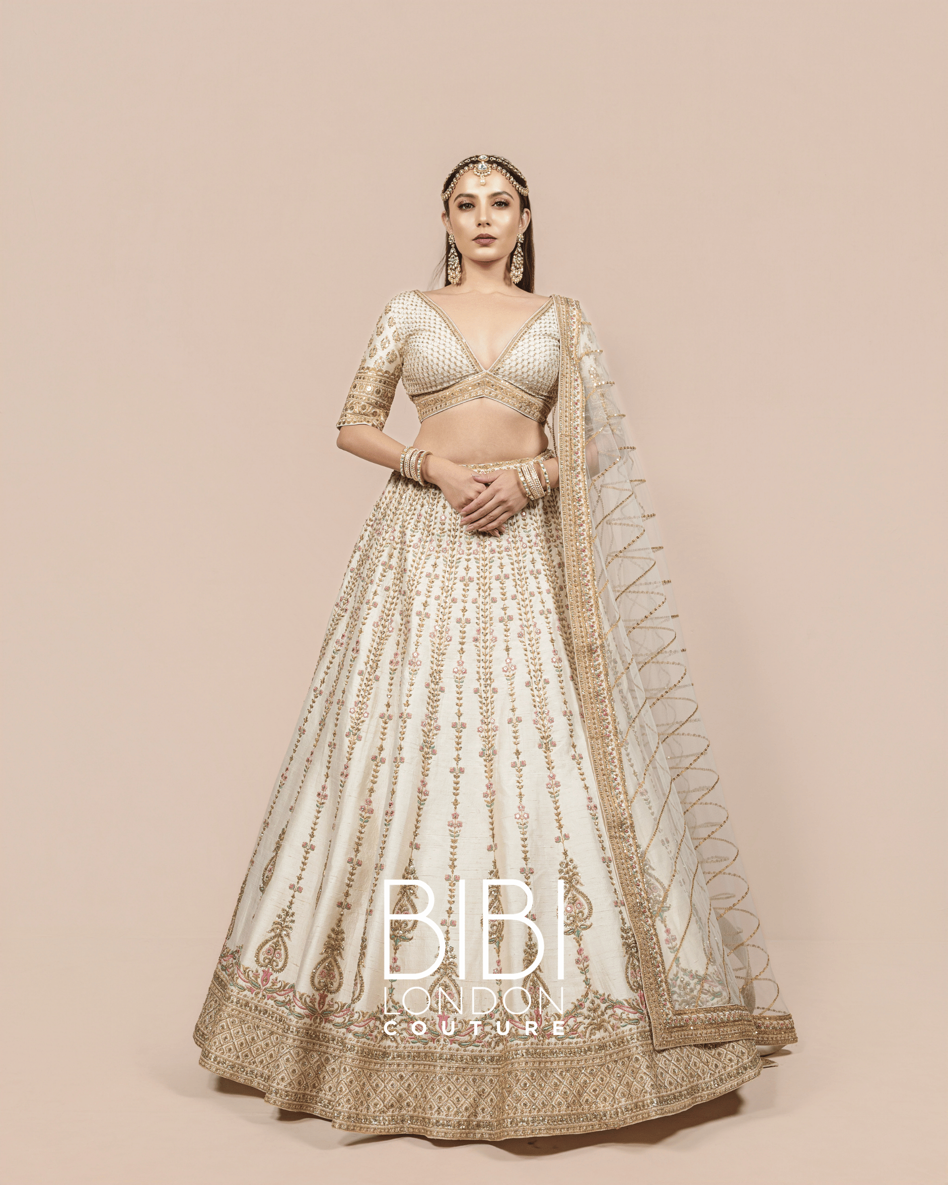 Ivory and Gold Embroidered Lehenga with Pastel Accents