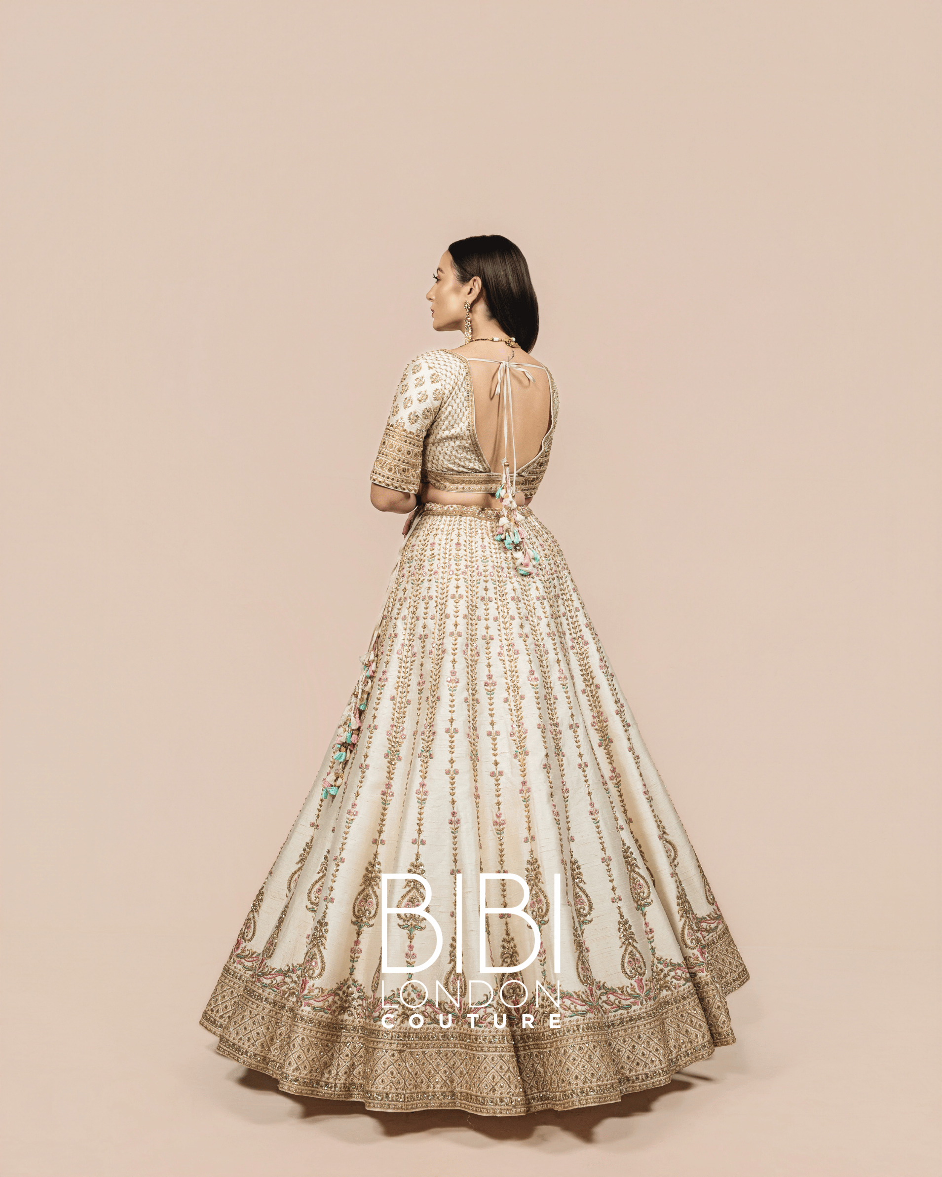 Ivory and Gold Embroidered Lehenga with Pastel Accents