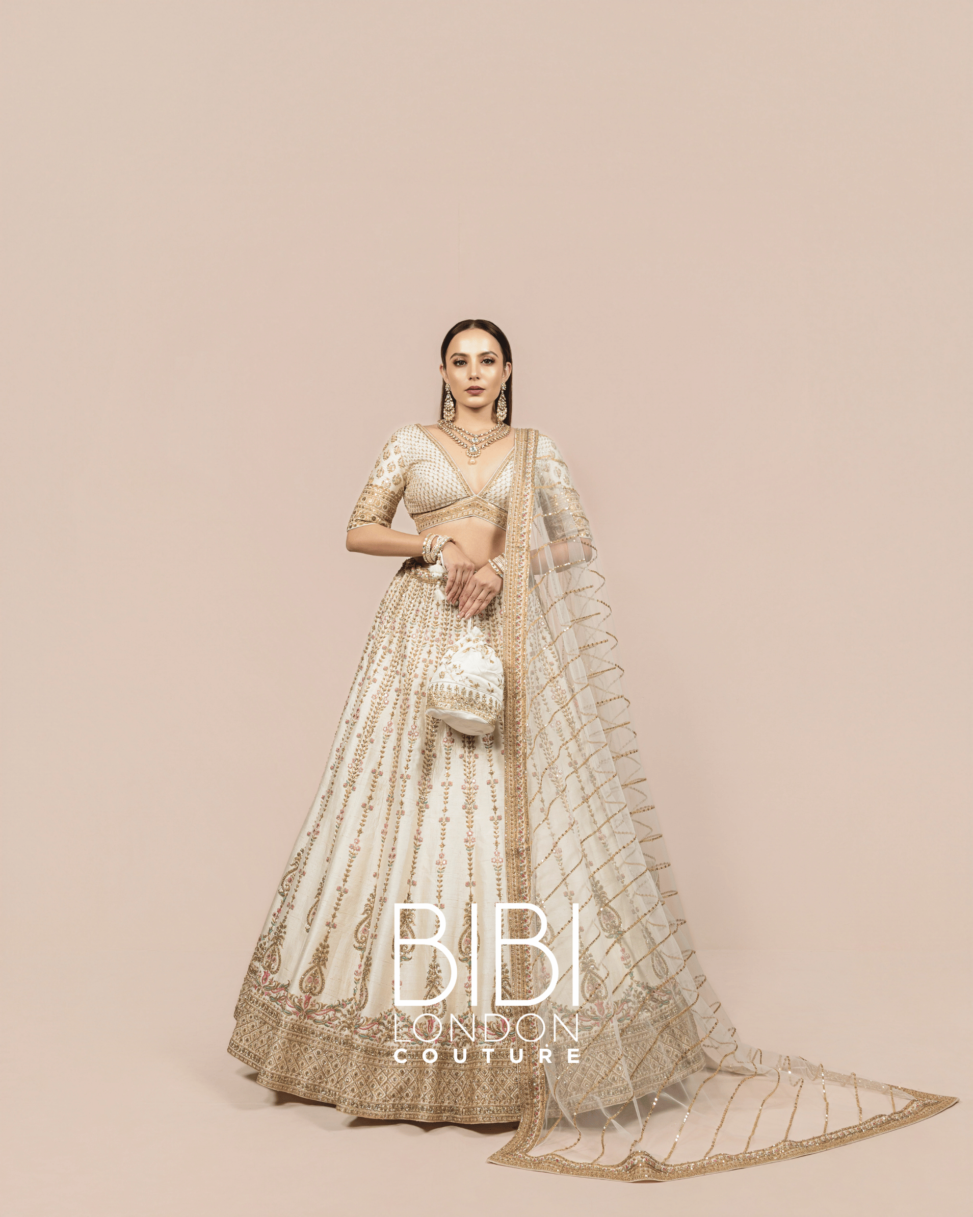 Ivory and Gold Embroidered Lehenga with Pastel Accents