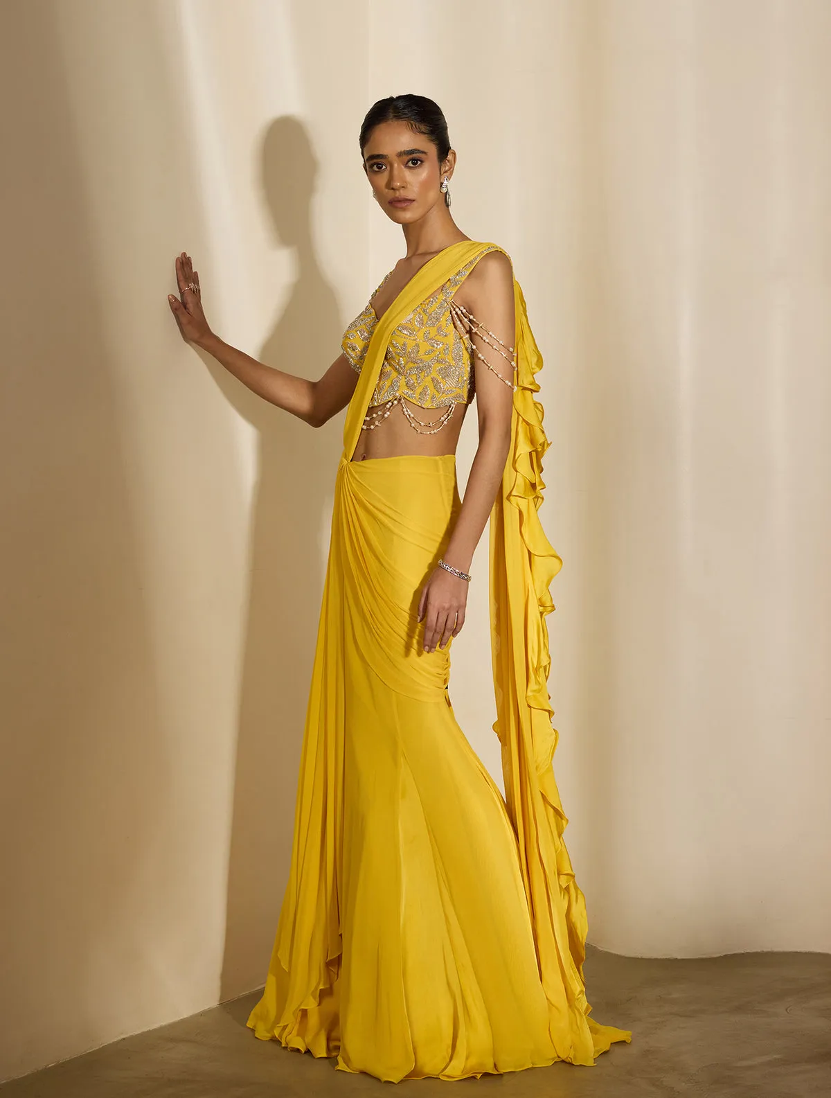 Yellow Drape Saree with Silver Embroidered Blouse and Ruffled Pallu