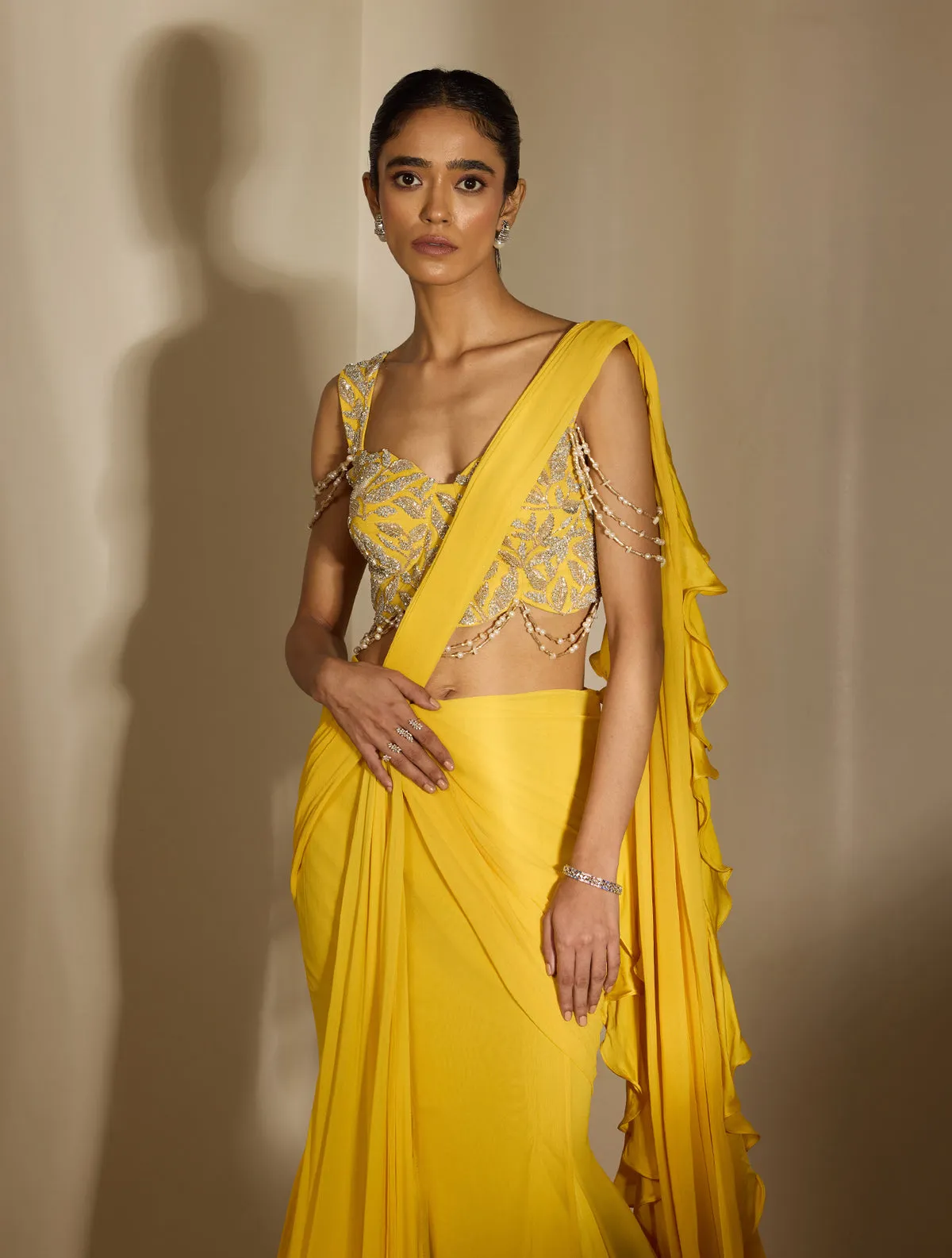 Yellow Drape Saree with Silver Embroidered Blouse and Ruffled Pallu