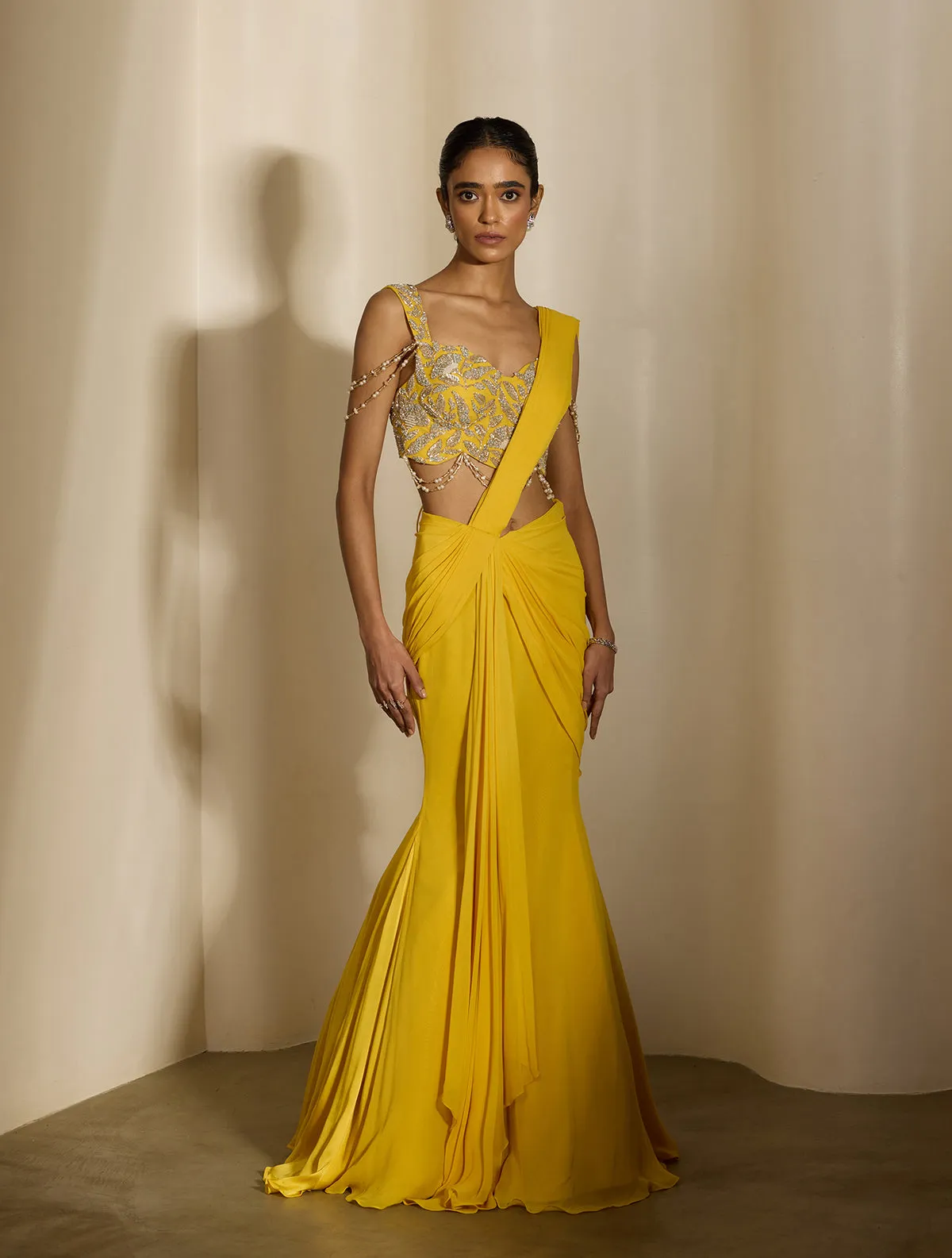 Yellow Drape Saree with Silver Embroidered Blouse and Ruffled Pallu