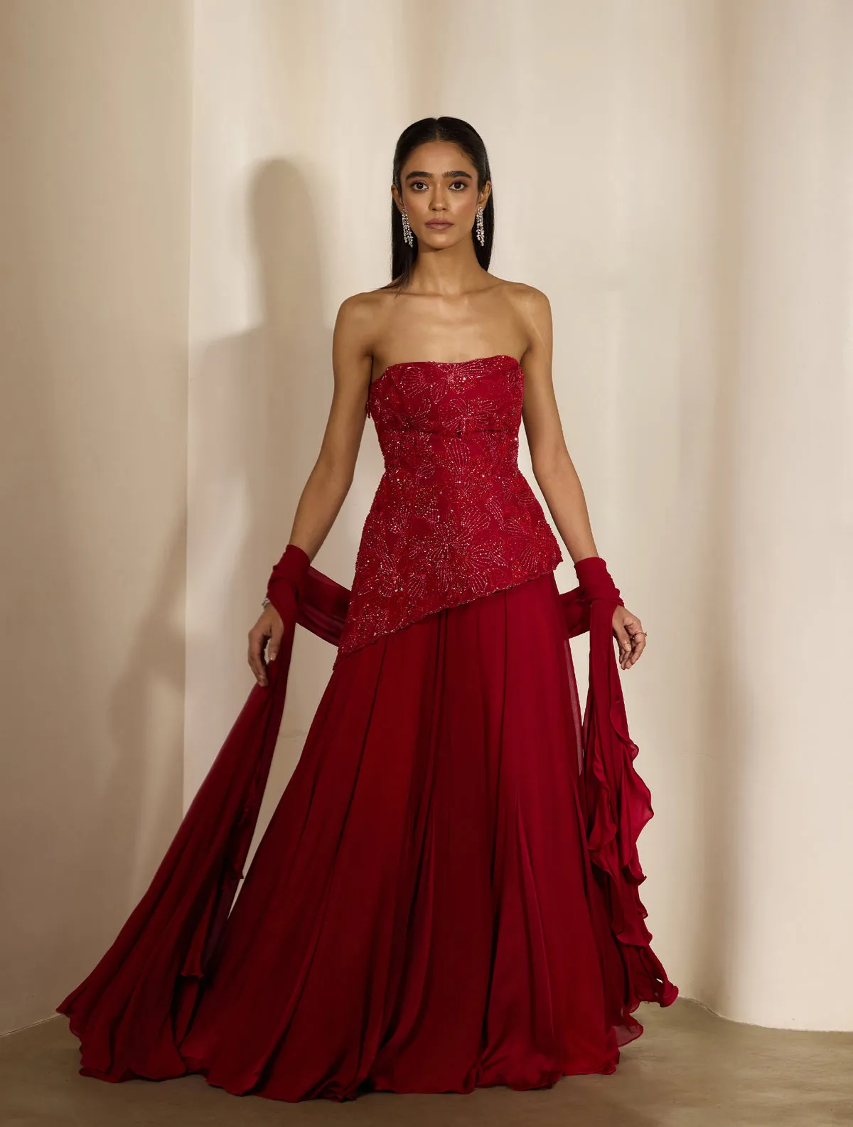 Red Strapless Lehenga with Embellished Blouse and Flowing Dupatta Panels