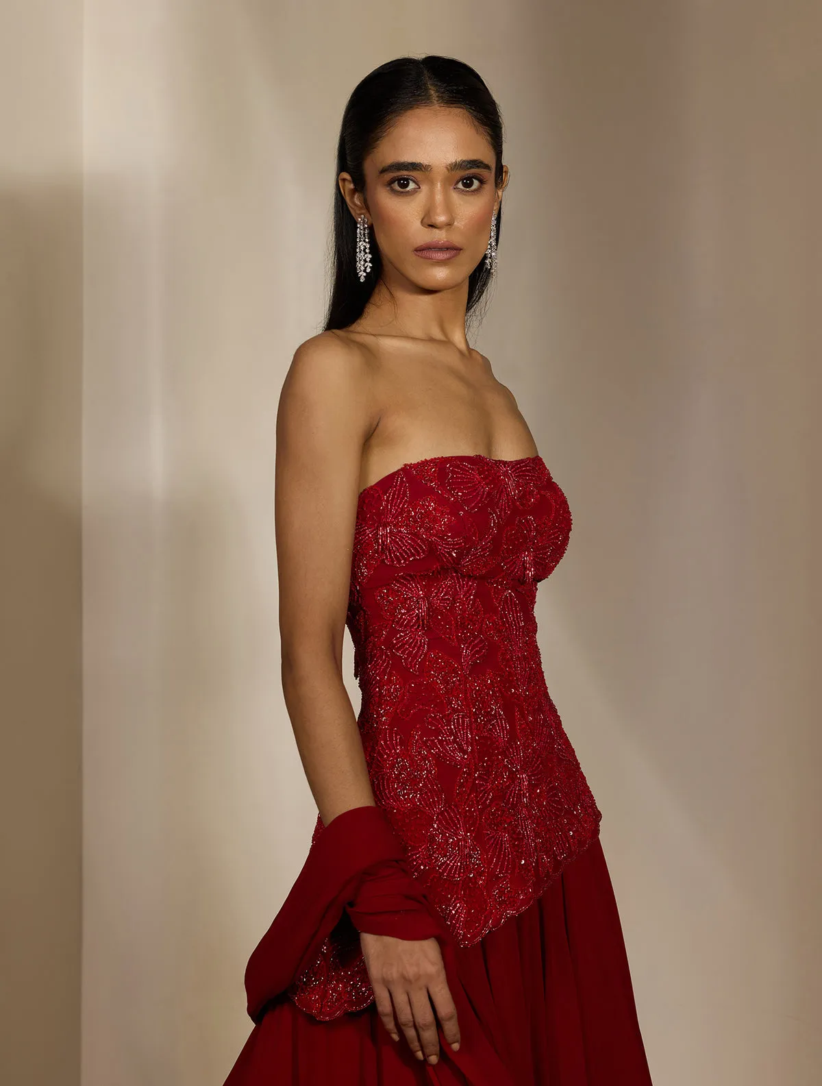 Red Strapless Lehenga with Embellished Blouse and Flowing Dupatta Panels