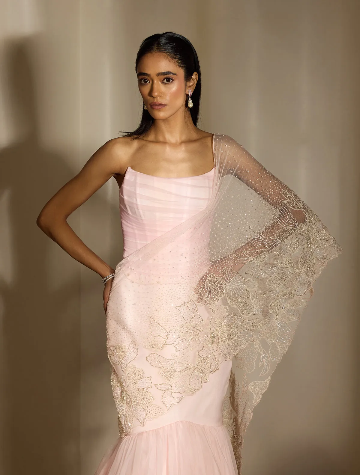 Blush Pink Lehenga with Embellished Blouse and Net Dupatta