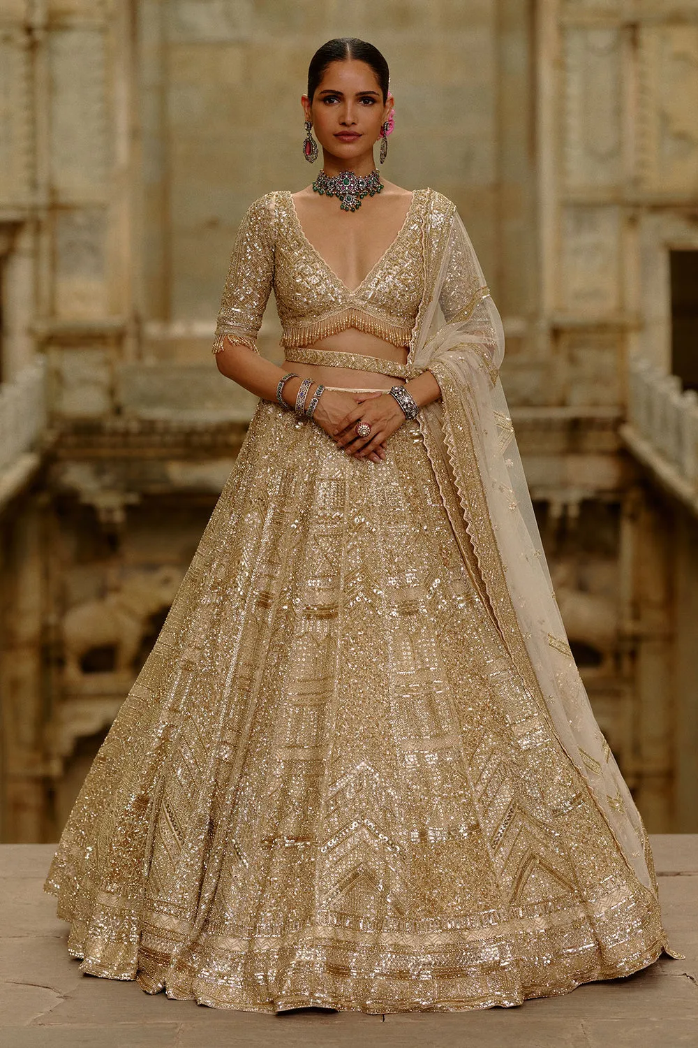 Gold Embroidered Bridal Lehenga with Red Veil Dupatta