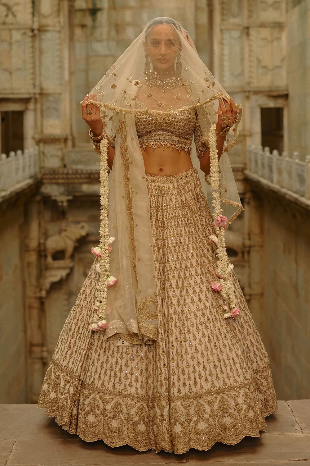 Ivory Gold Embroidered Bridal Lehenga with Sheer Veil