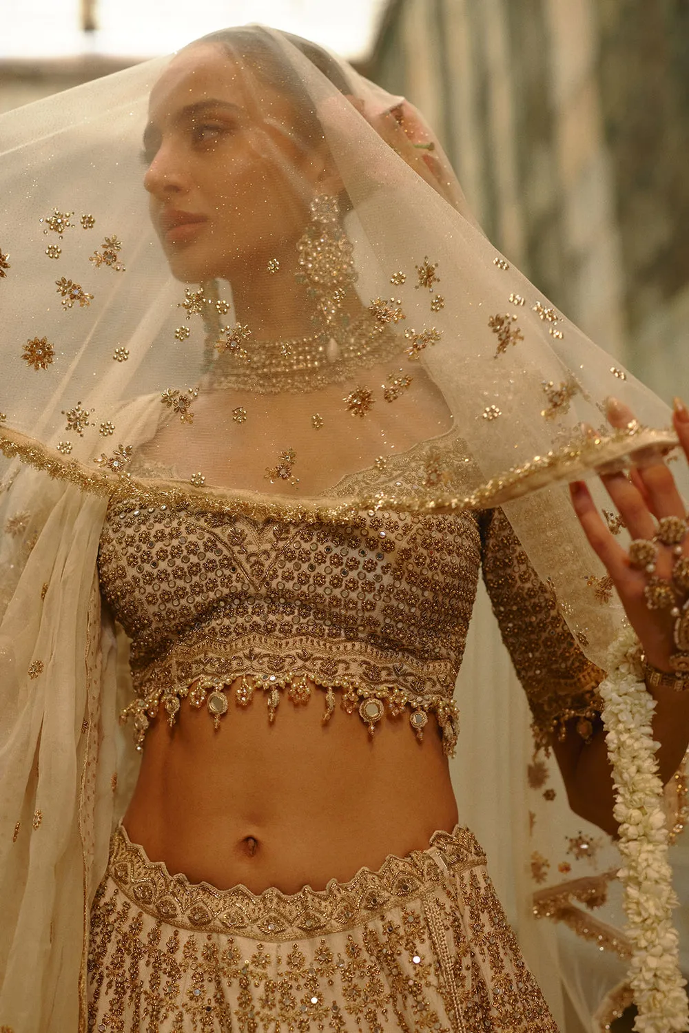 Ivory Gold Embroidered Bridal Lehenga with Sheer Veil