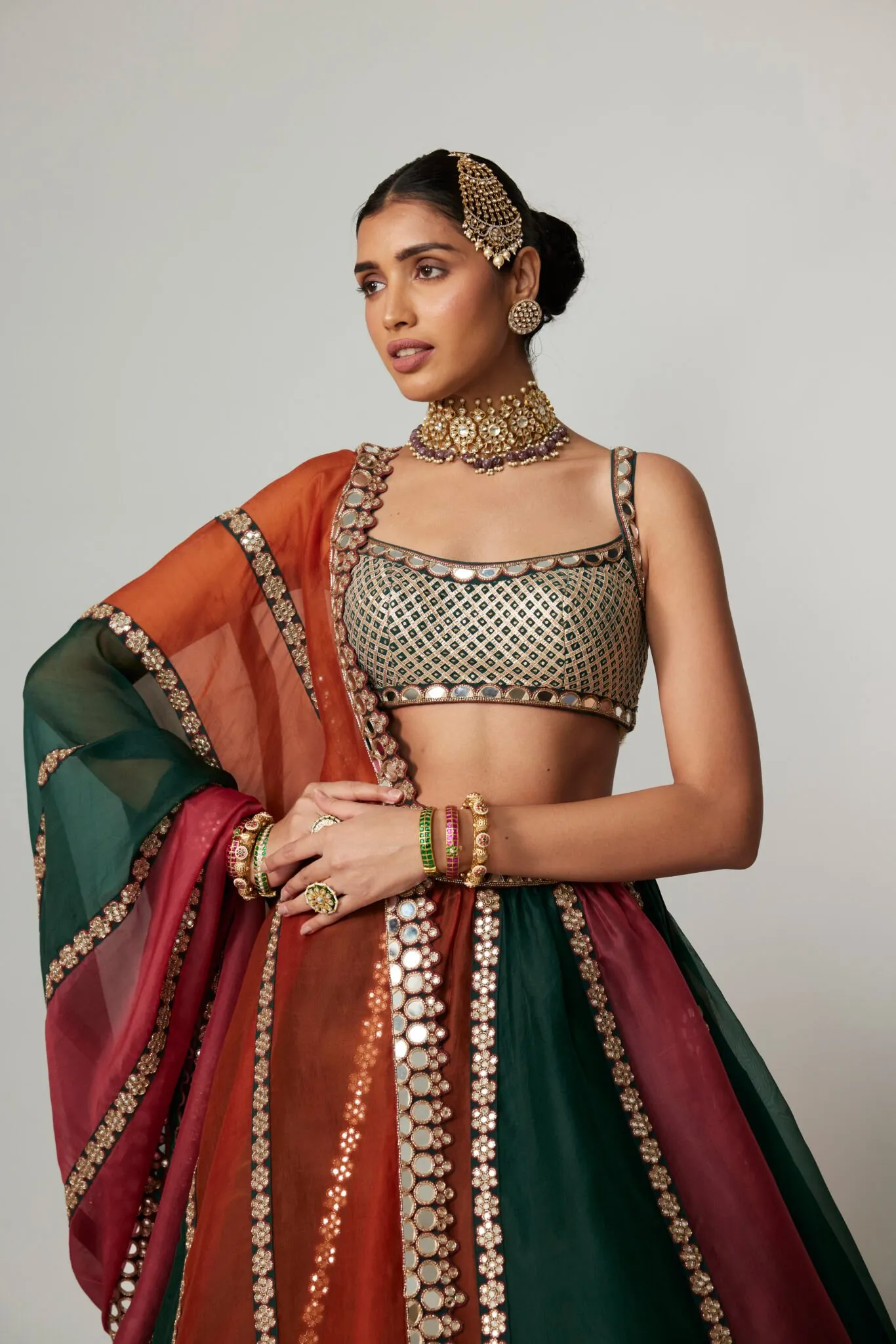Striped Rust and Emerald Bridal Lehenga with Mirror Work Dupatta