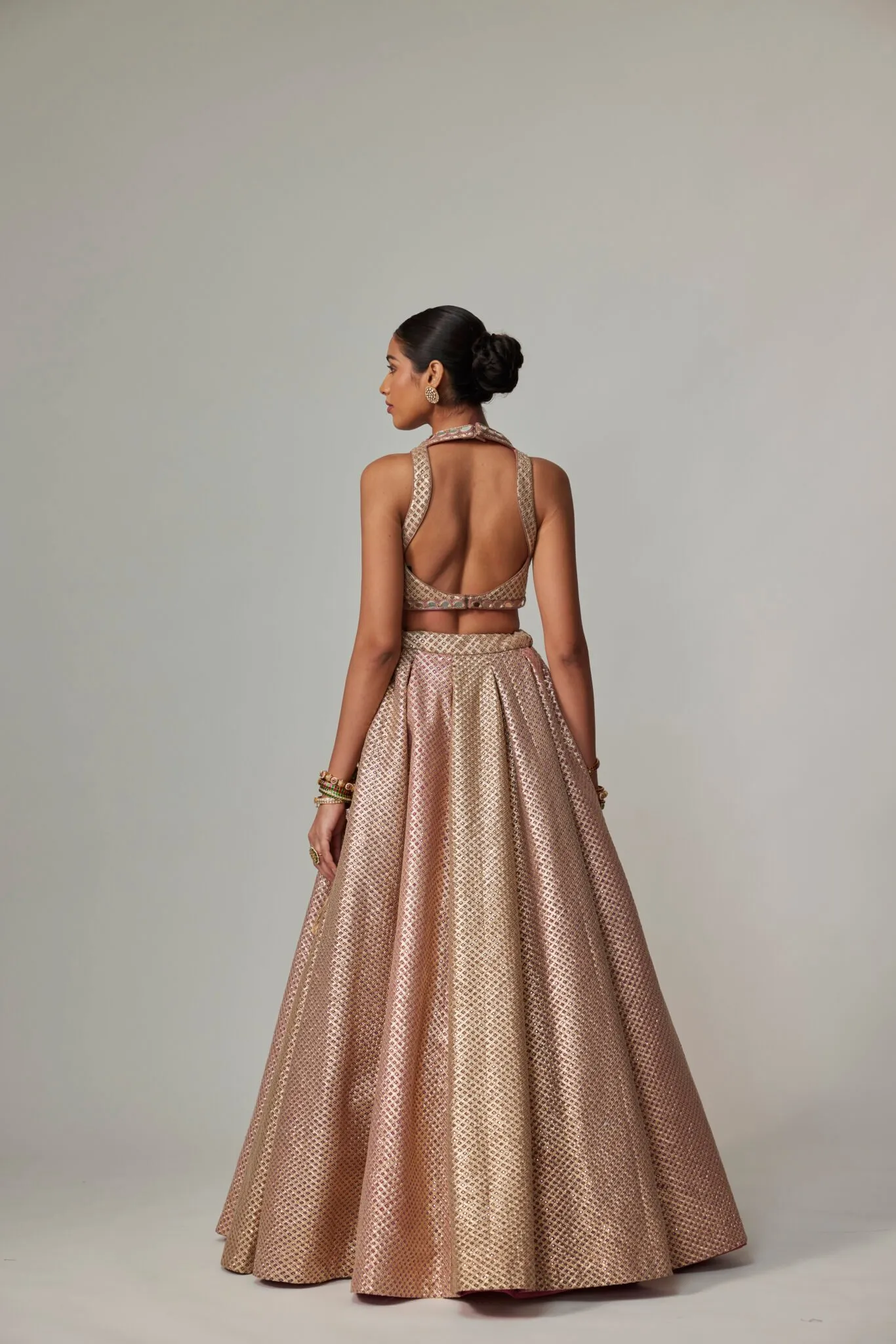 Golden Brocade Lehenga with Halter Neck Blouse