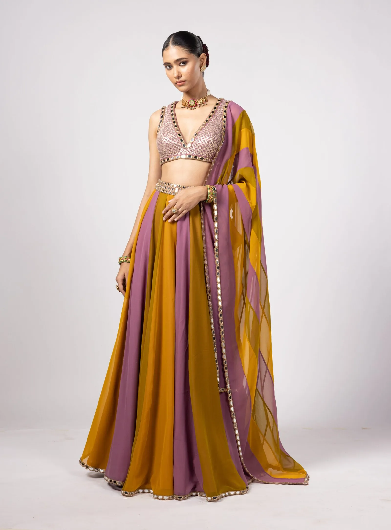Vibrant Mustard and Mauve Lehenga with Embellished Mirror Work Blouse