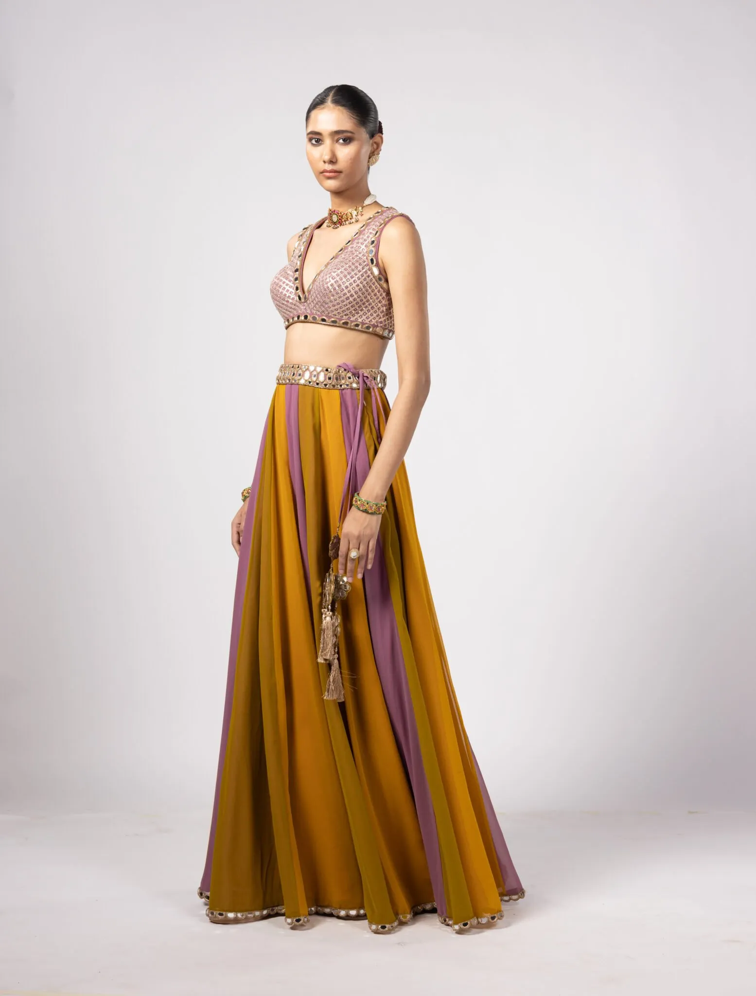 Vibrant Mustard and Mauve Lehenga with Embellished Mirror Work Blouse