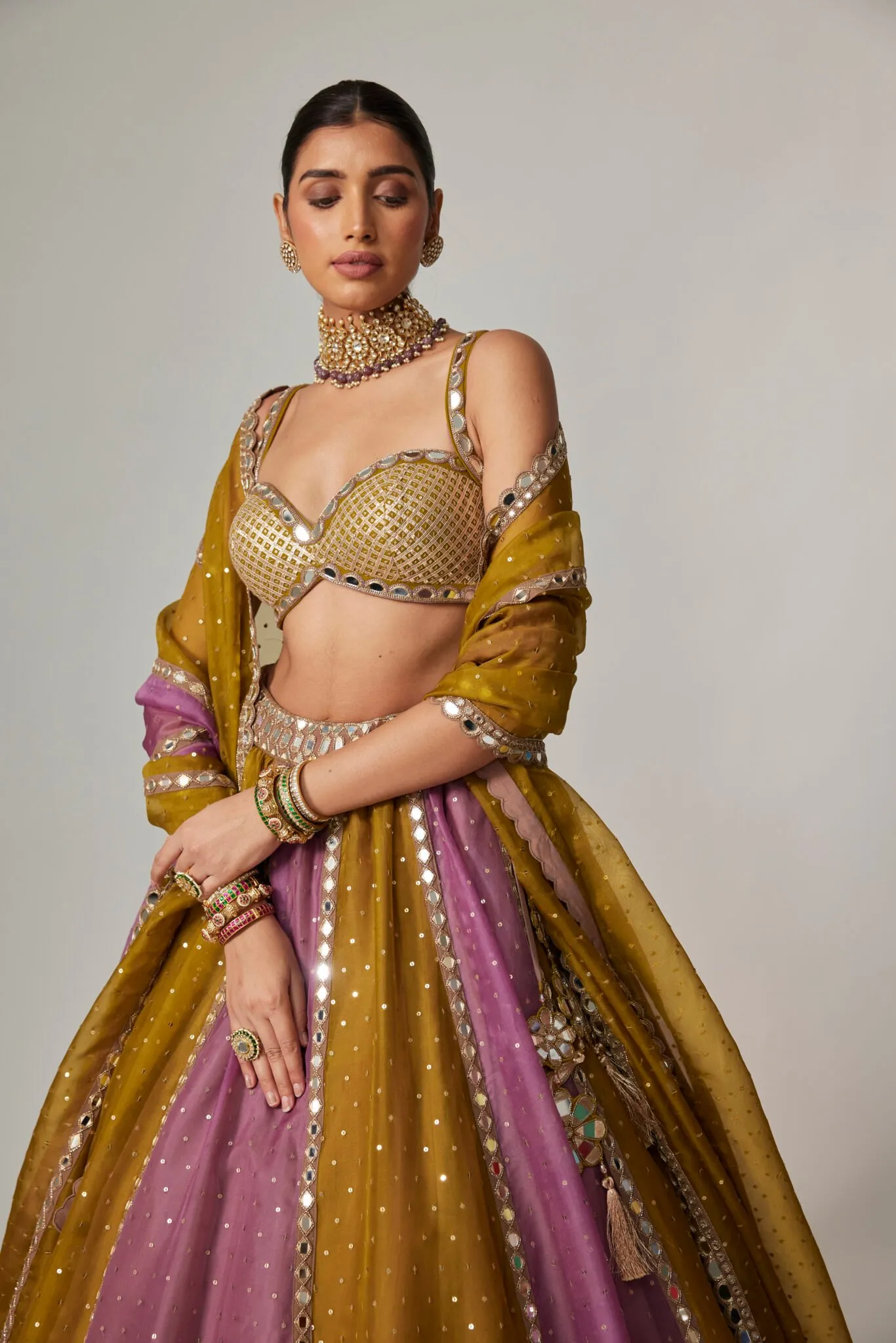 Regal Mustard and Mauve Mirror Work Lehenga with Embellished Blouse and Dupatta