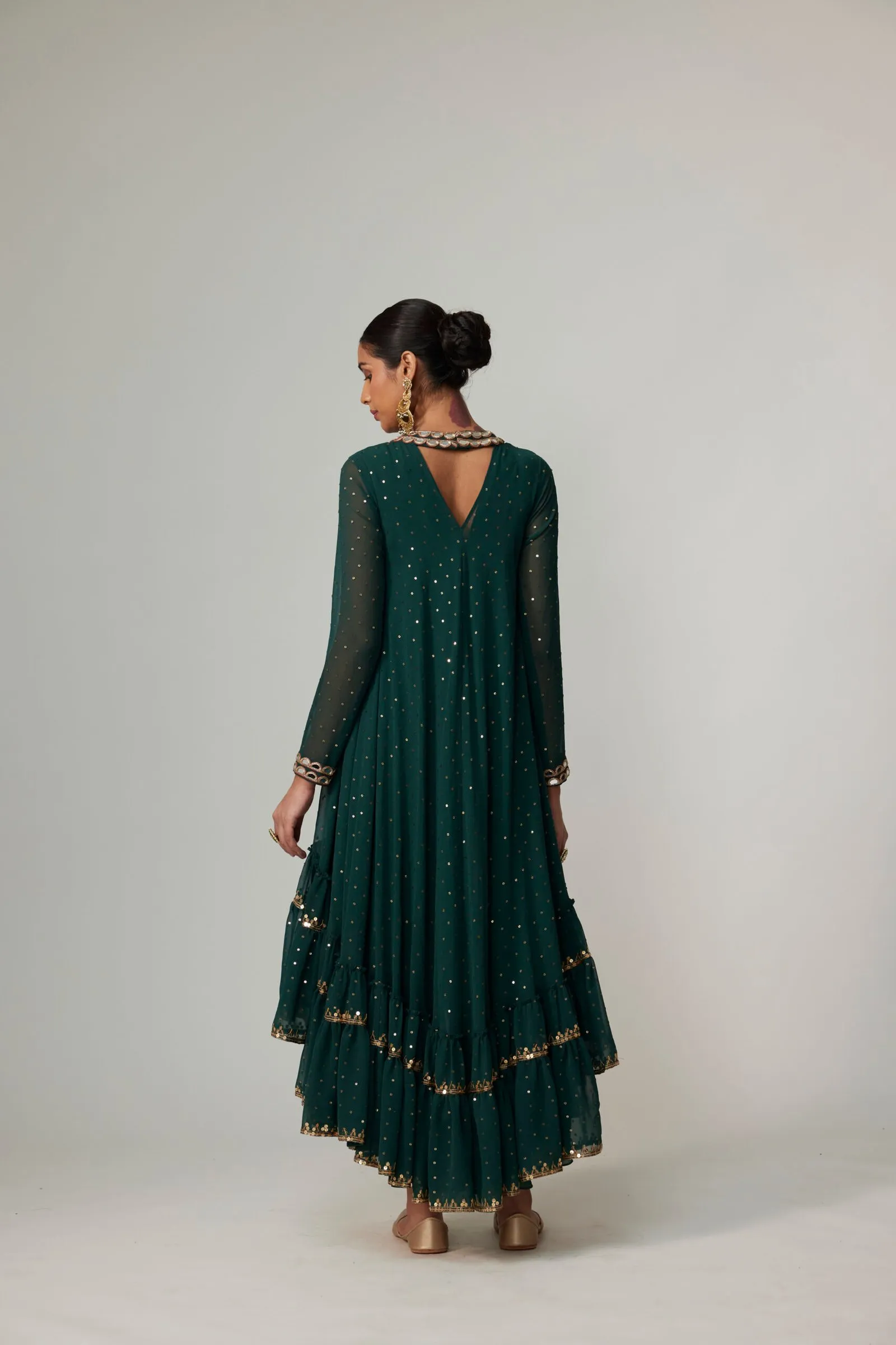 Festive Emerald Green Sharara Set with Rust Dupatta and Gold Detailing