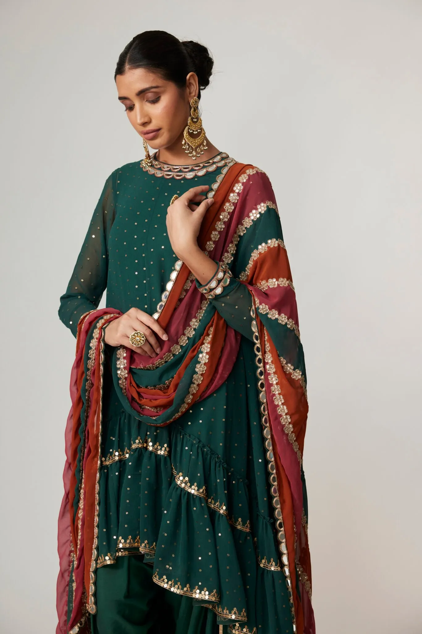 Festive Emerald Green Sharara Set with Rust Dupatta and Gold Detailing
