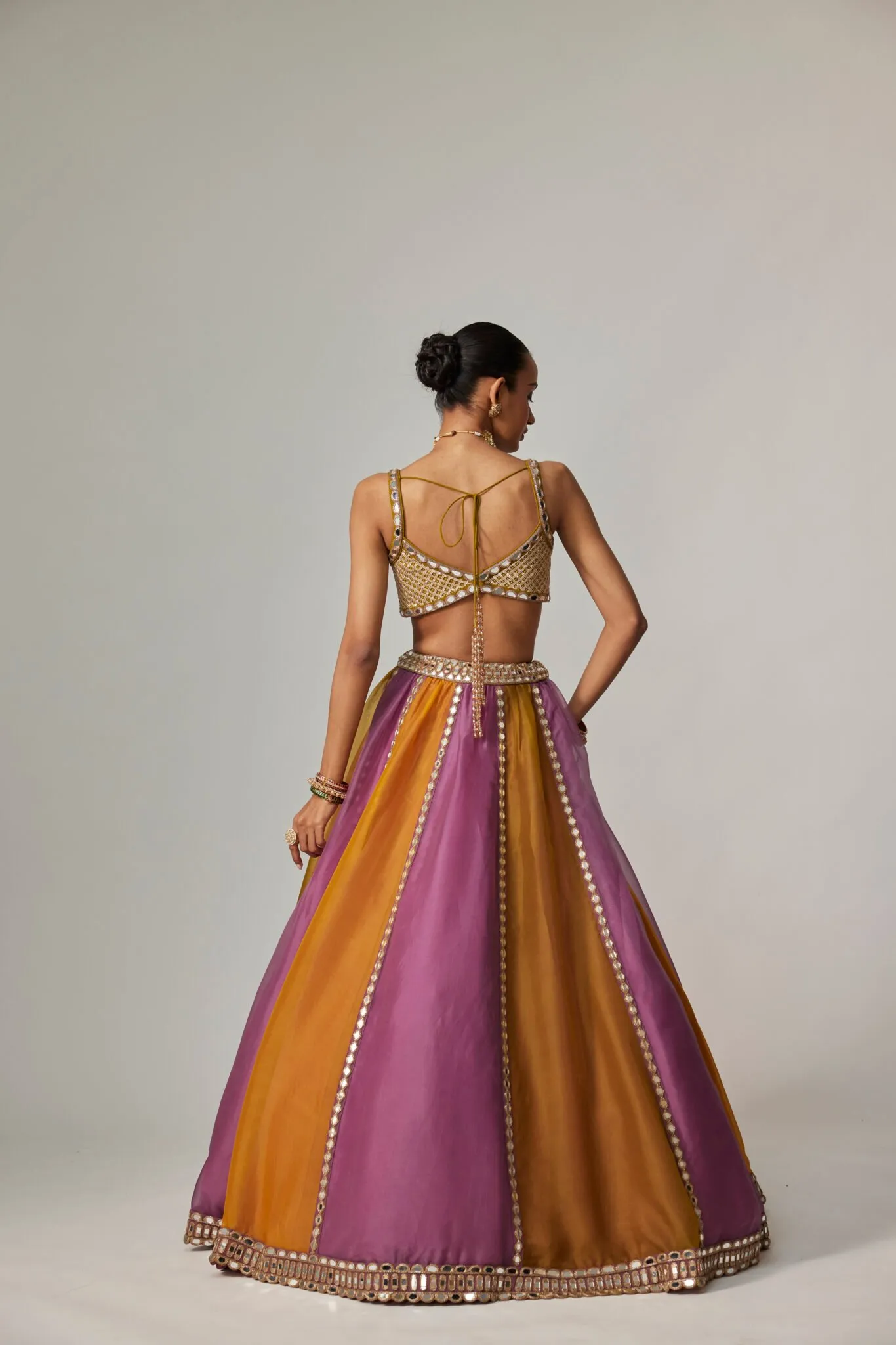 Mustard and Lilac Panelled Lehenga with Mirror Work Blouse