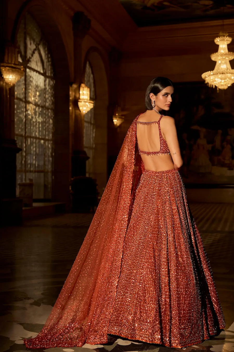 Burnt Crimson Lehenga with All-Over Sequin Embroidery and Embellished Blouse