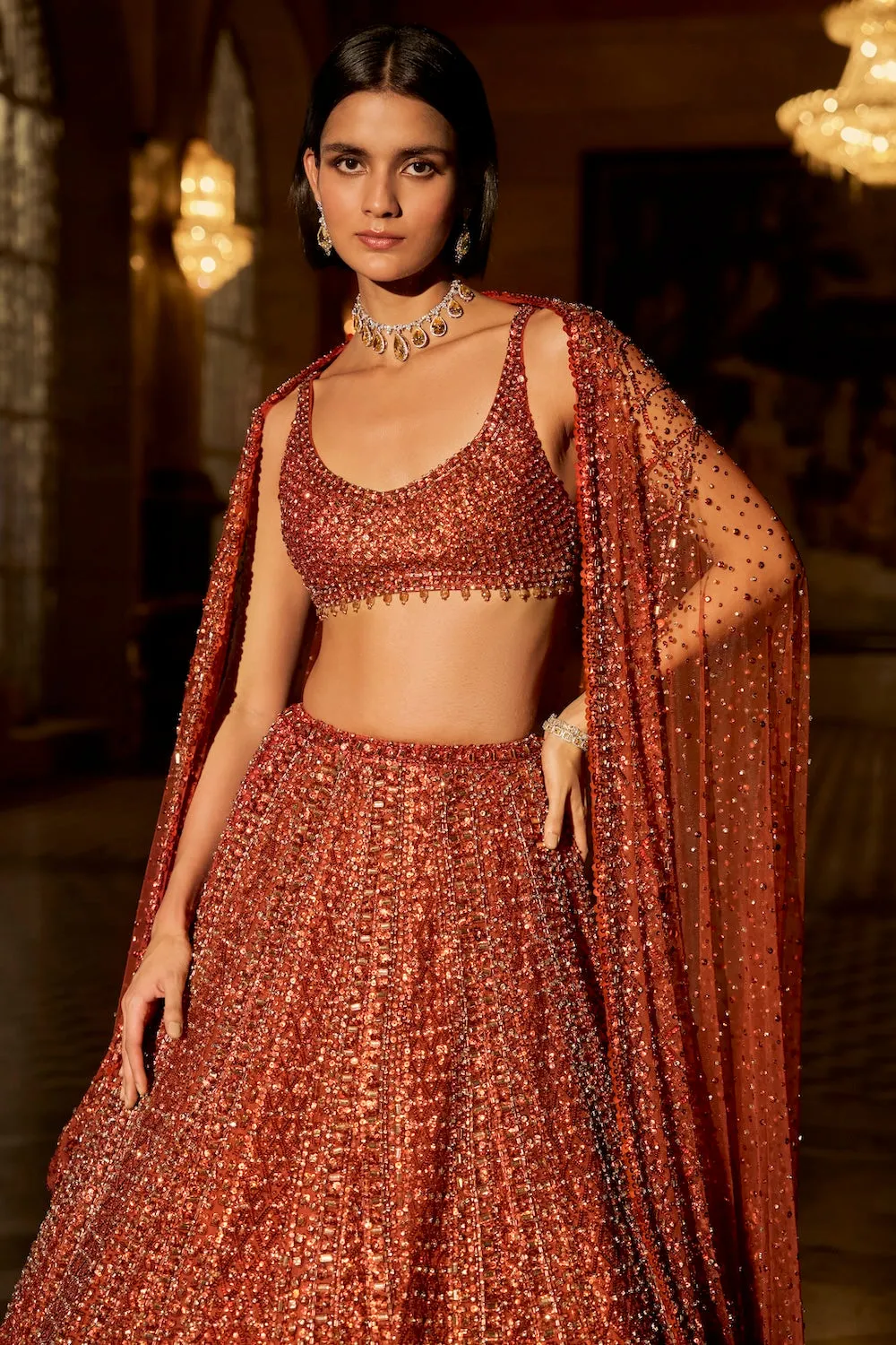 Burnt Crimson Lehenga with All-Over Sequin Embroidery and Embellished Blouse