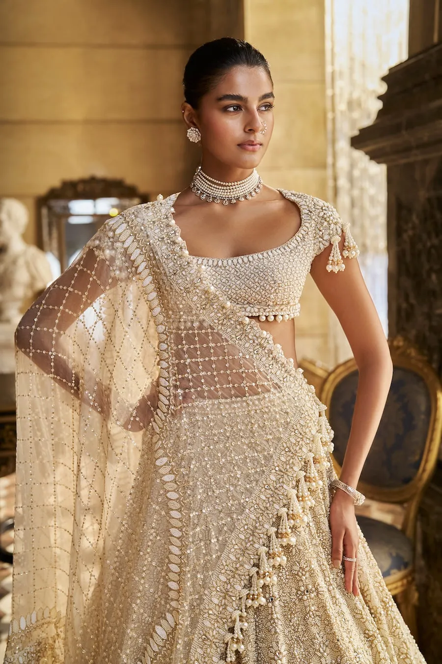 Ivory Lehenga with Intricate Pearl and Thread Embroidery