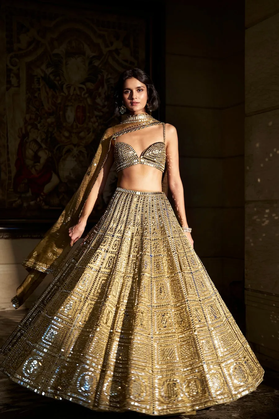 Antique Gold Lehenga with Mirrorwork Geometry and Embellished Blouse