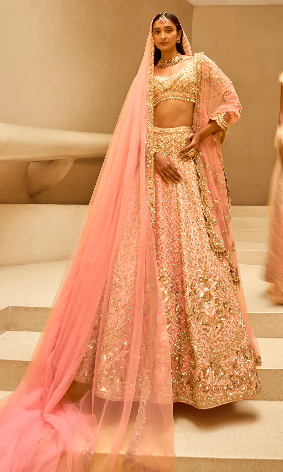 Blush Peach Lehenga with Intricate Zardozi, Mirrorwork, and Sequin Embroidery