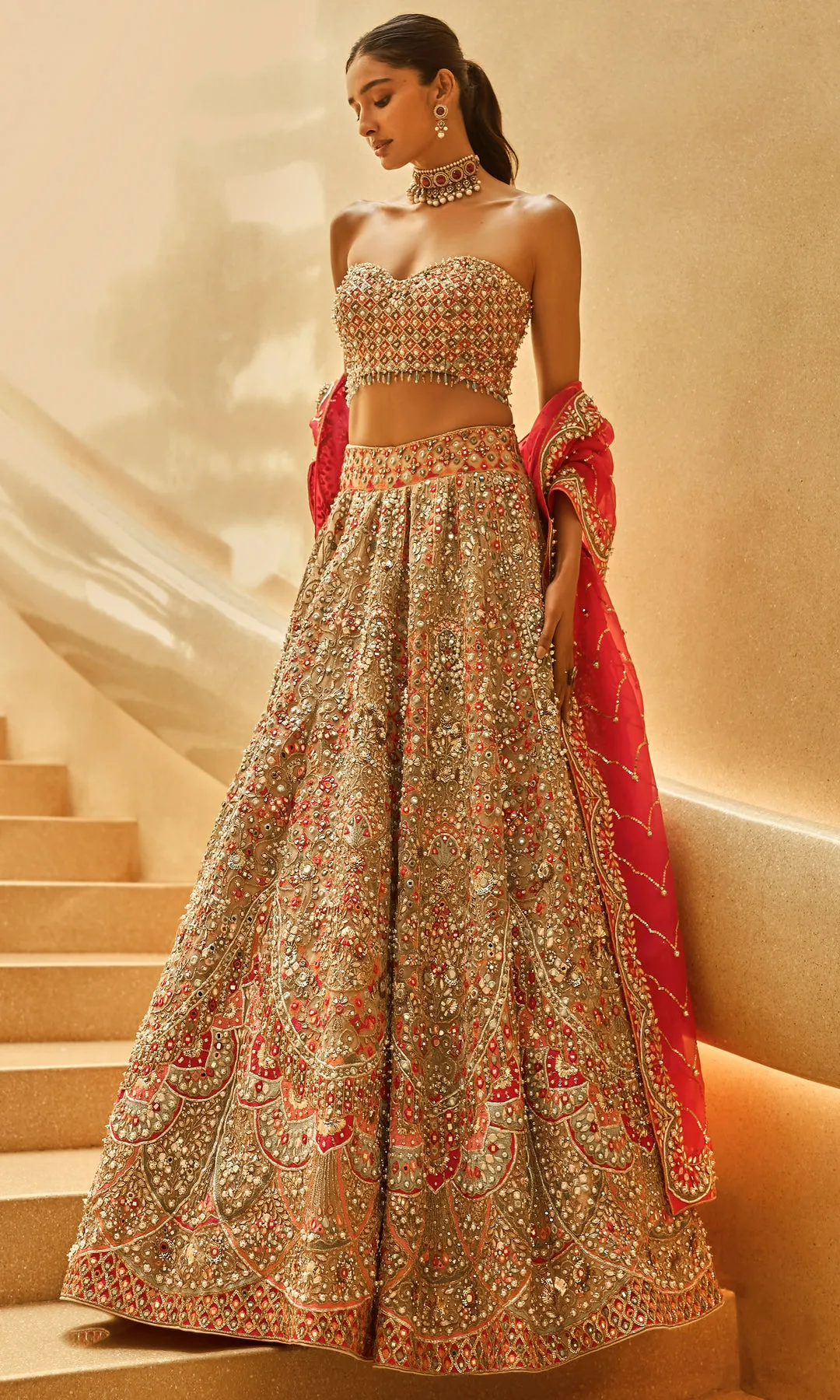 Antique Gold Lehenga with Multicolour Zardozi, Mirrorwork, and Red Accents