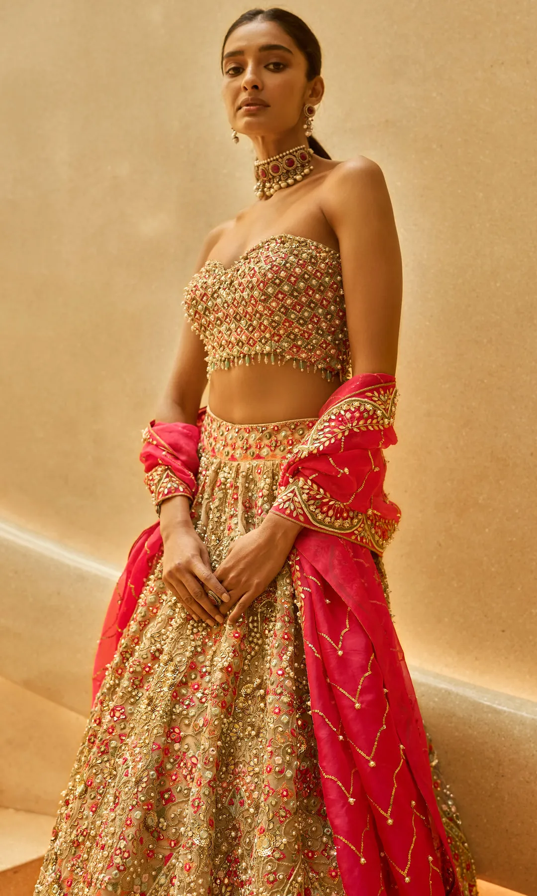 Antique Gold Lehenga with Multicolour Zardozi, Mirrorwork, and Red Accents