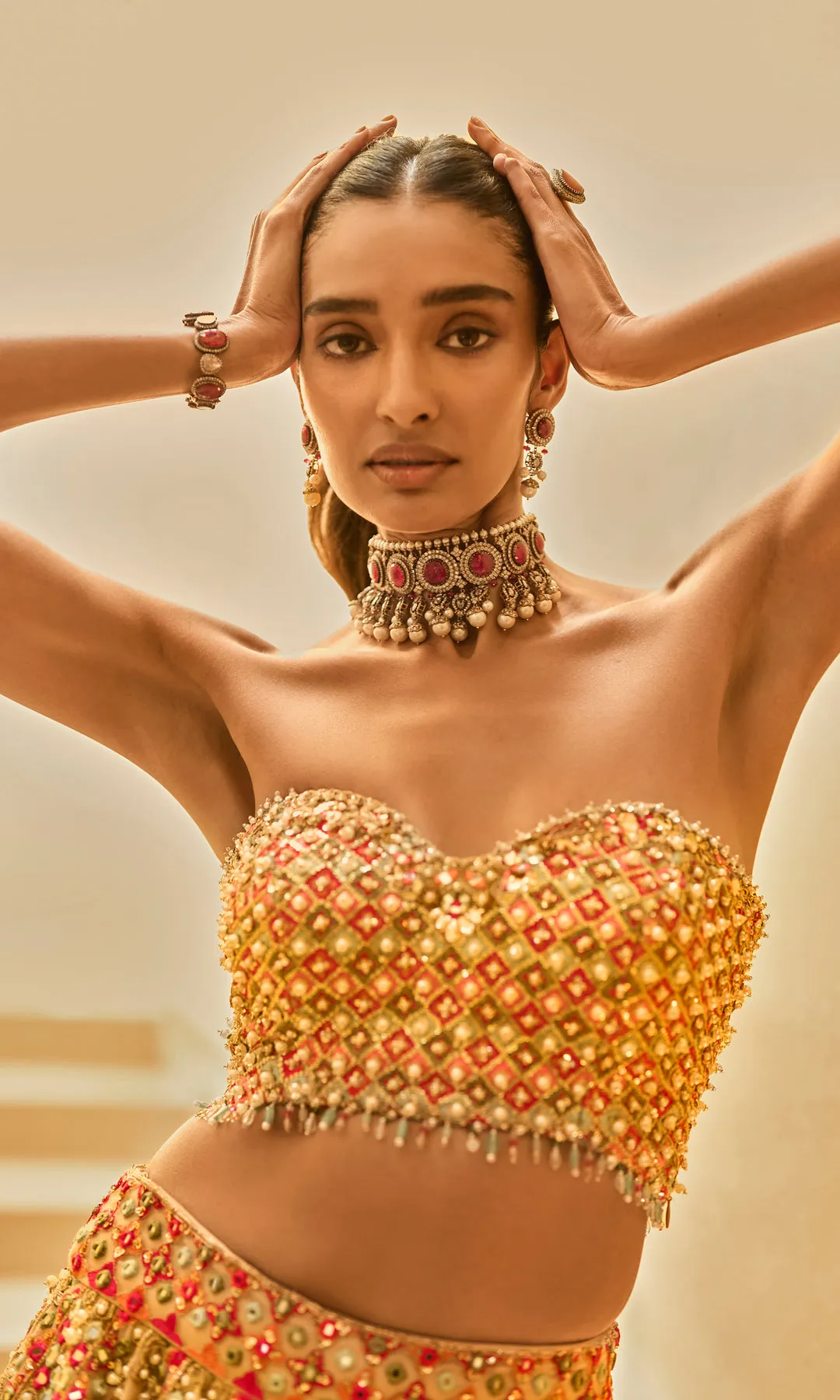 Antique Gold Lehenga with Multicolour Zardozi, Mirrorwork, and Red Accents