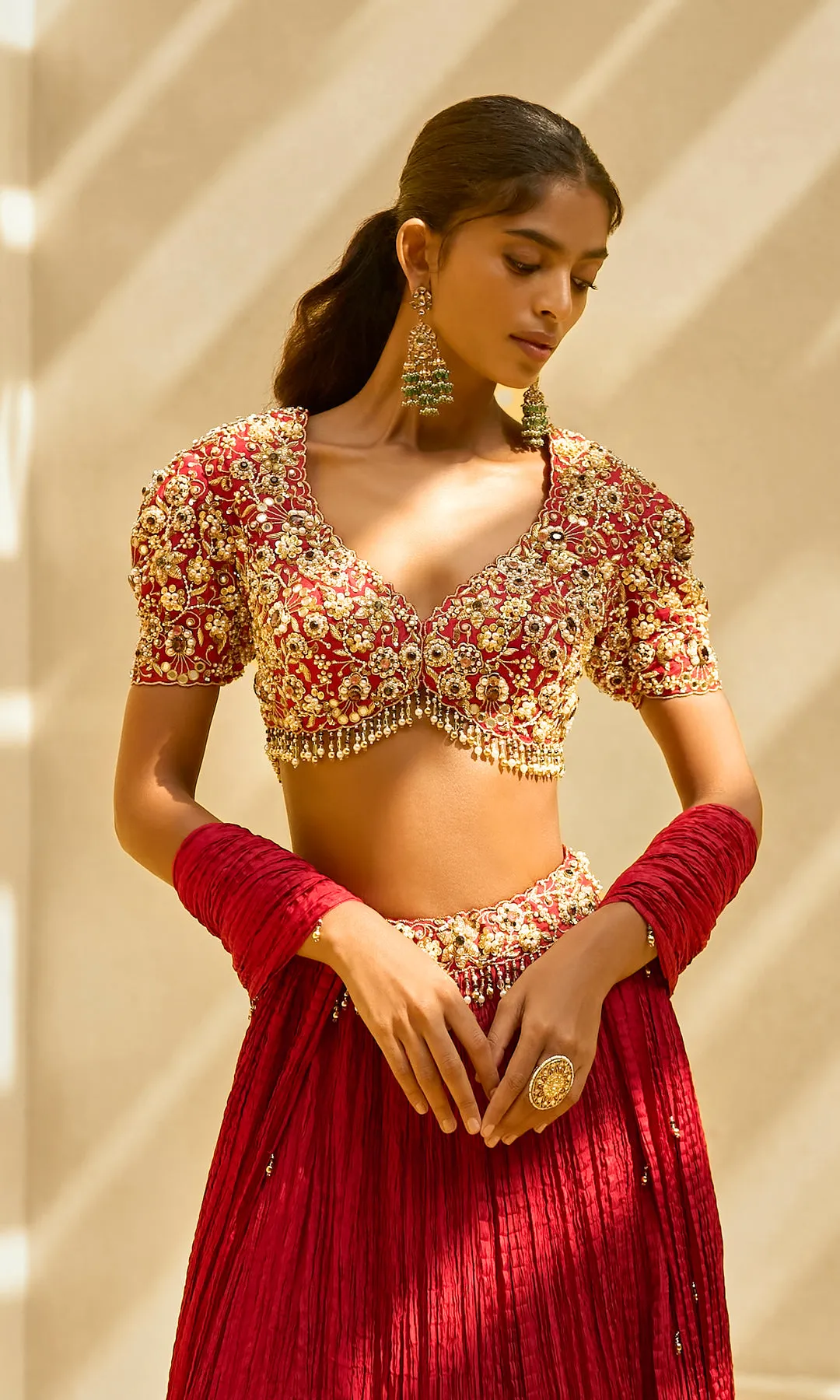 Crimson Pleated Lehenga with Gold Embroidered Blouse