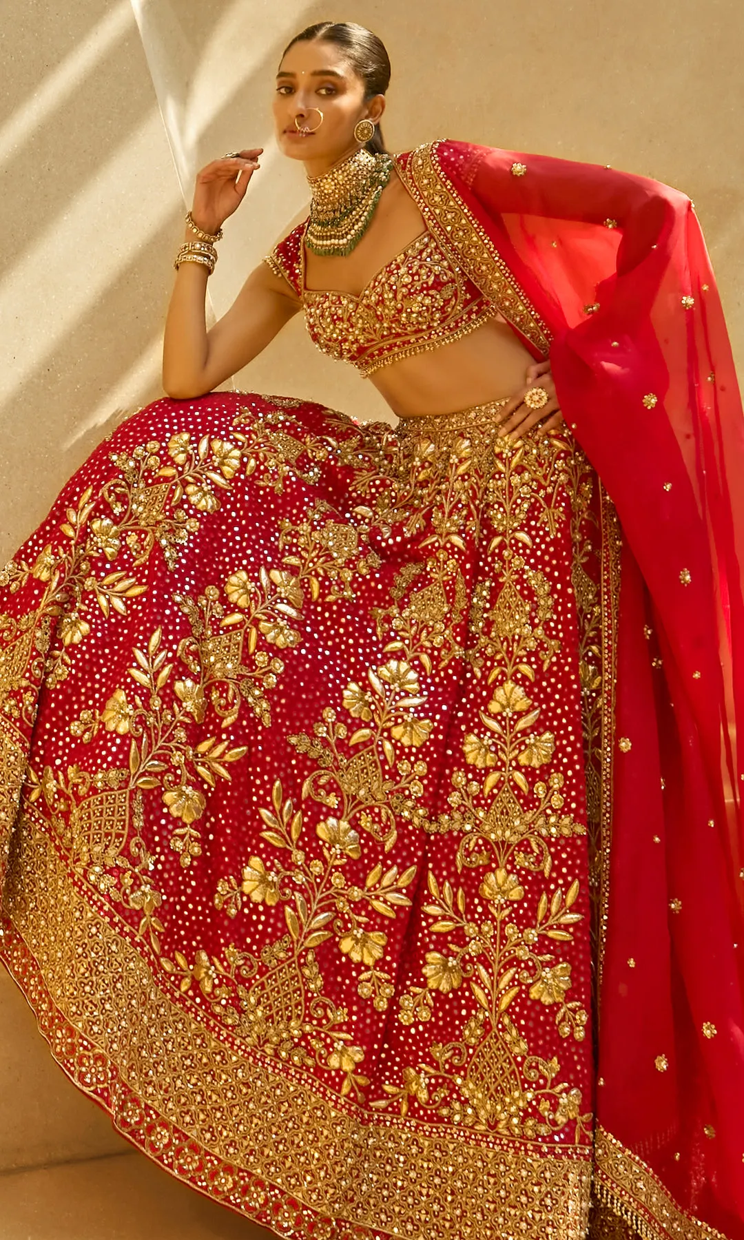 Scarlet Bridal Lehenga with Intricate Gold Embroidery