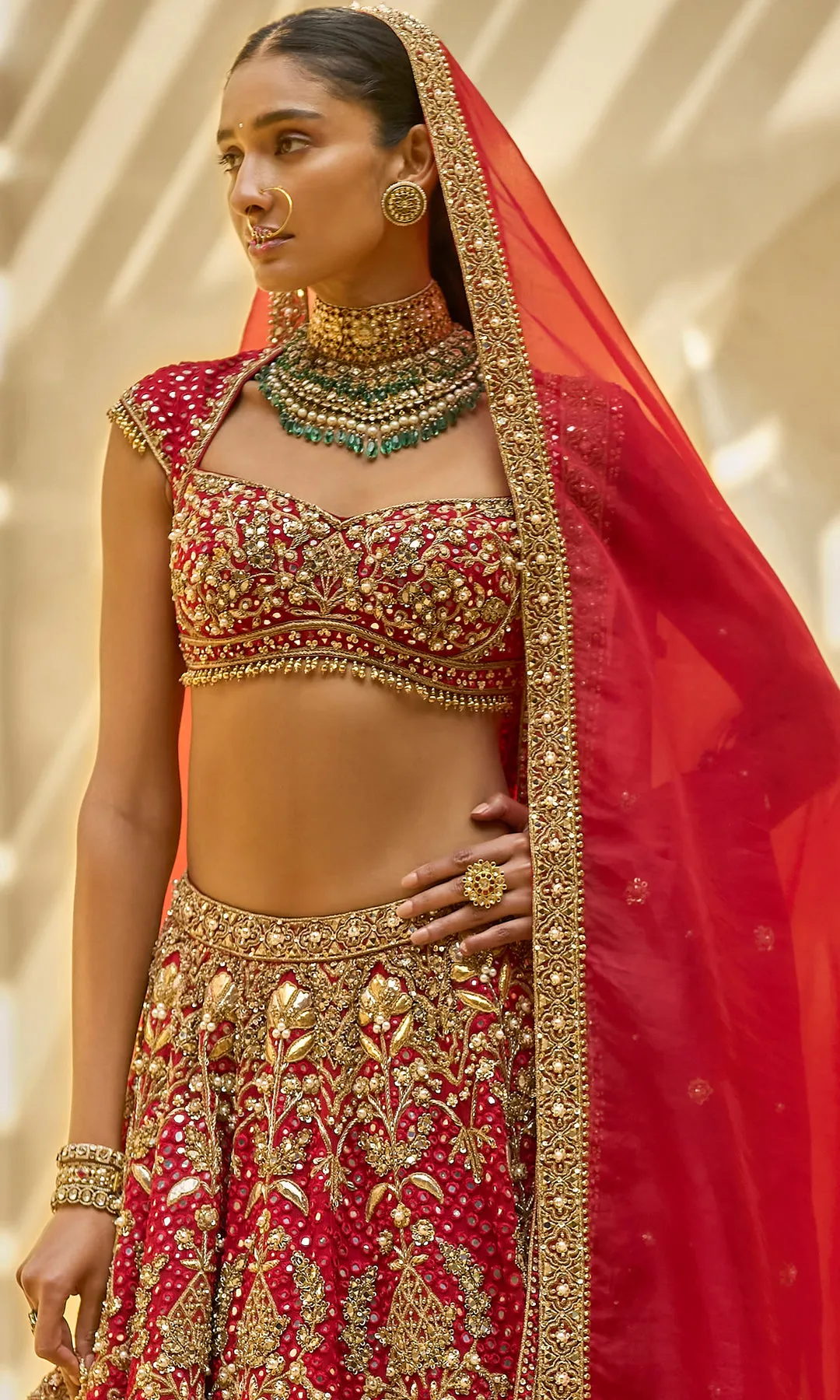 Scarlet Bridal Lehenga with Intricate Gold Embroidery