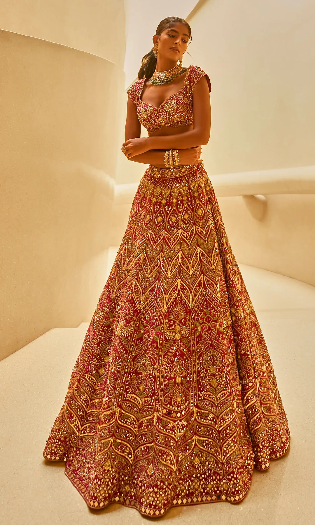 Deep Crimson Lehenga with All-Over Gold Chevron Zardozi Work