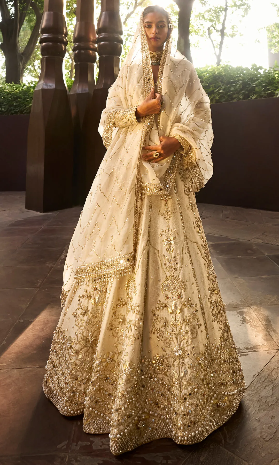 Ivory Bridal Lehenga with Gold Floral Zardozi and Pearl Embellishment