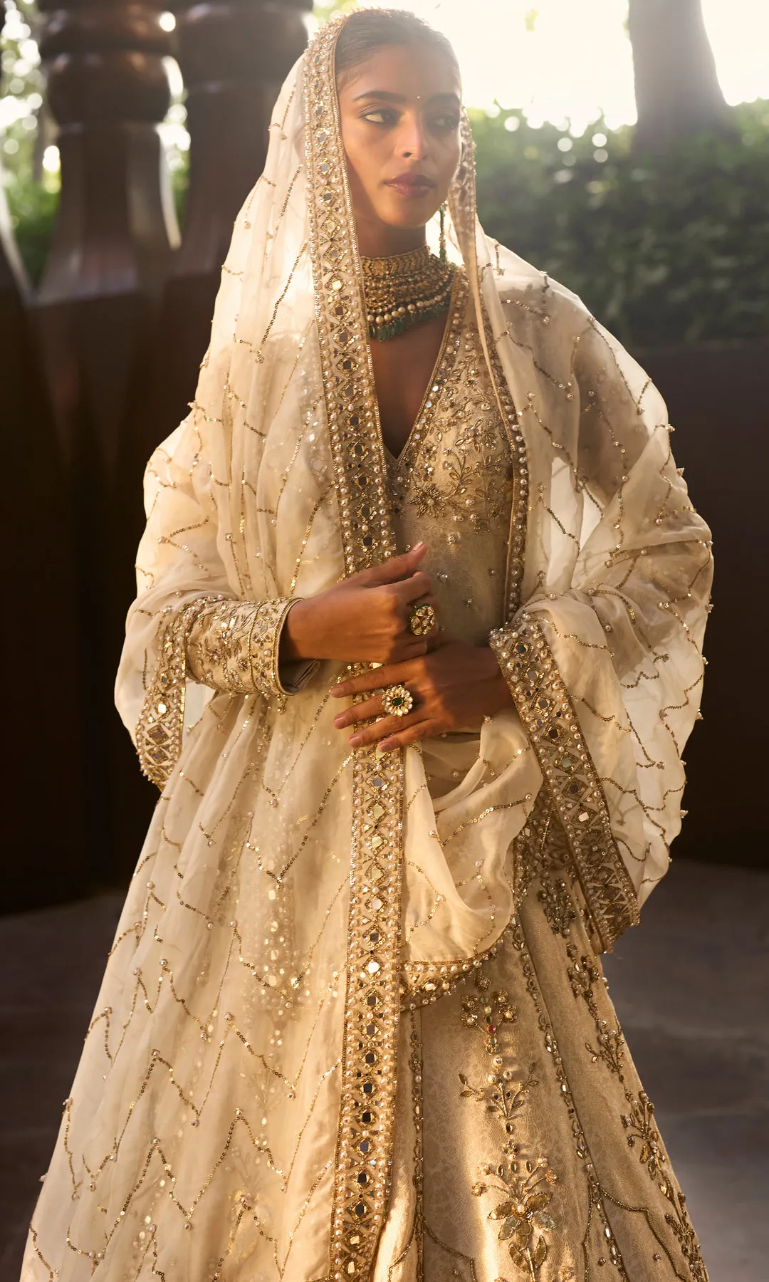 Ivory Bridal Lehenga with Gold Floral Zardozi and Pearl Embellishment