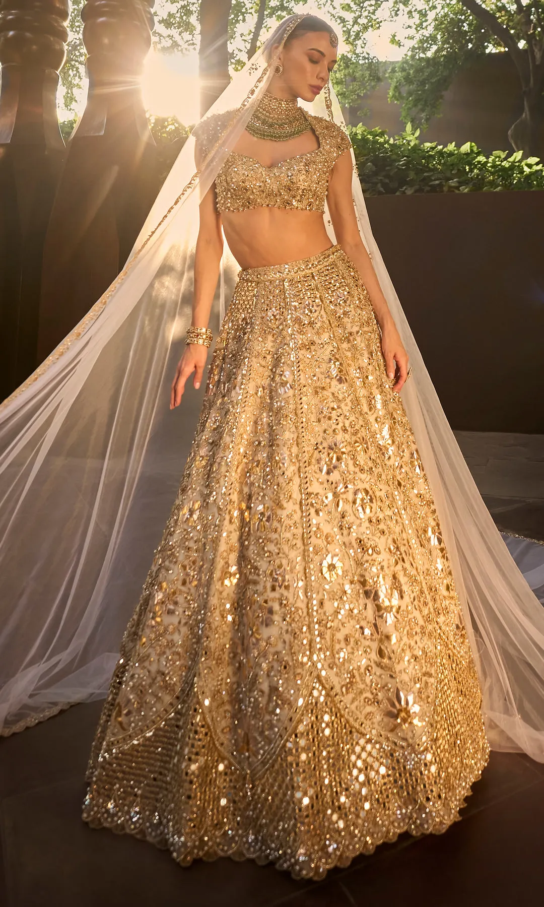 Champagne Gold Bridal Lehenga with Mirrorwork, Crystal Embellishment and Sheer Veil Dupatta
