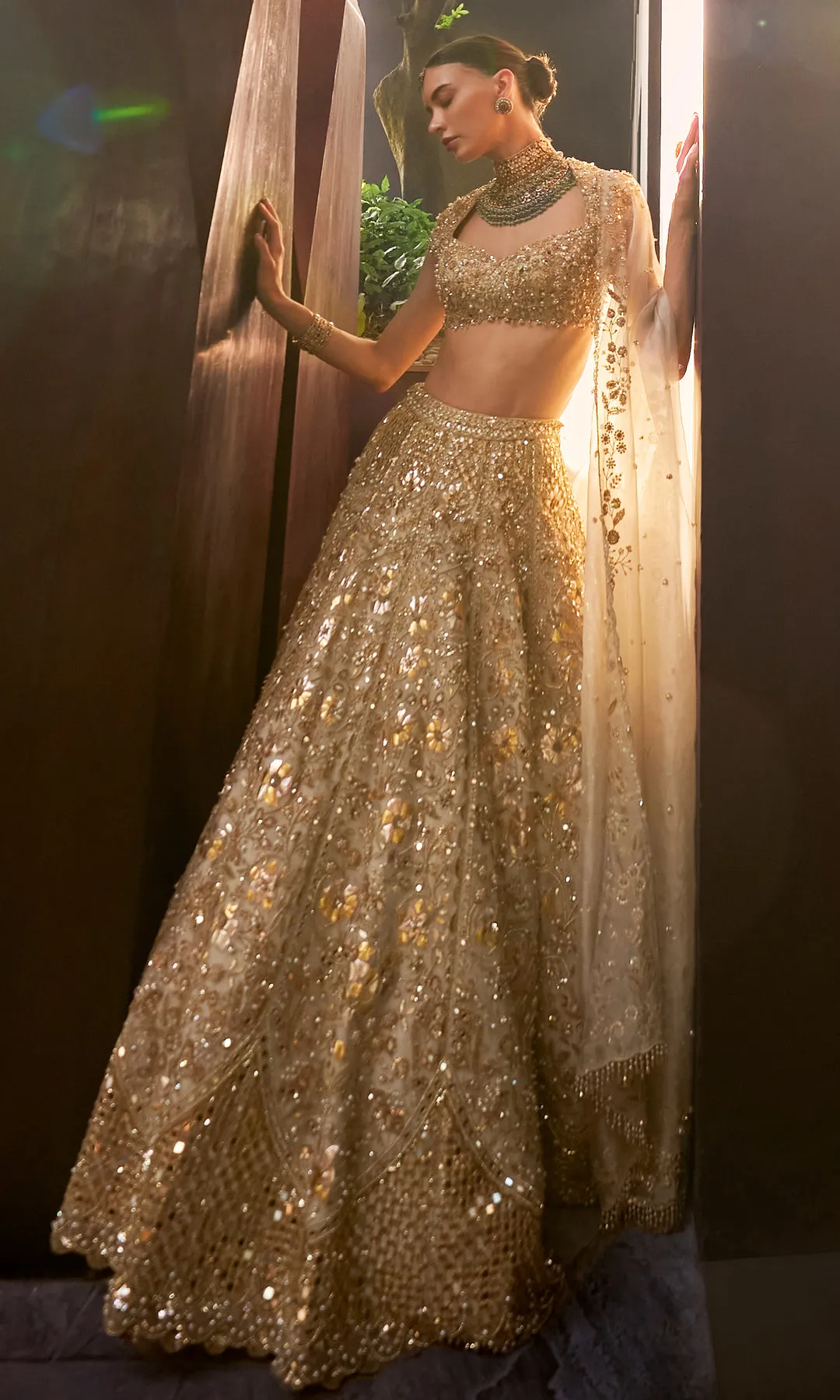 Champagne Gold Bridal Lehenga with Mirrorwork, Crystal Embellishment and Sheer Veil Dupatta