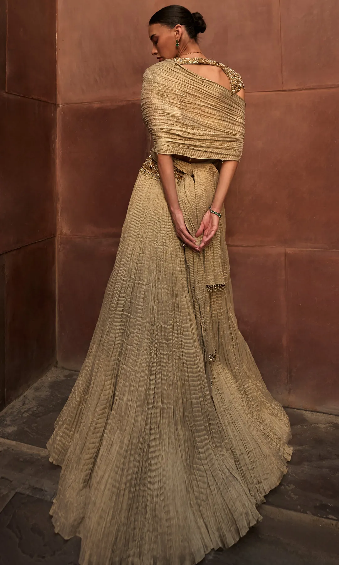 Antique Gold Pleated Lehenga with Heavily Embellished Blouse and Draped Dupatta
