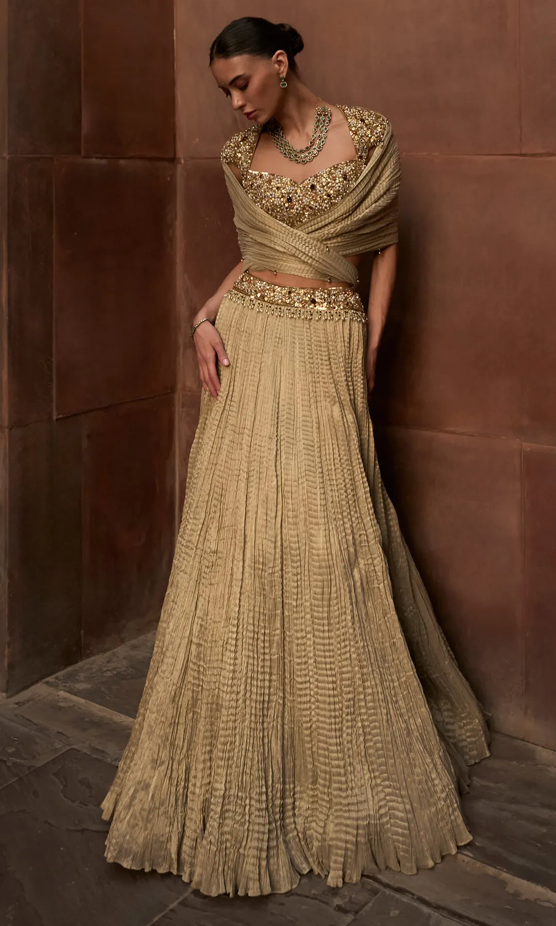 Antique Gold Pleated Lehenga with Heavily Embellished Blouse and Draped Dupatta