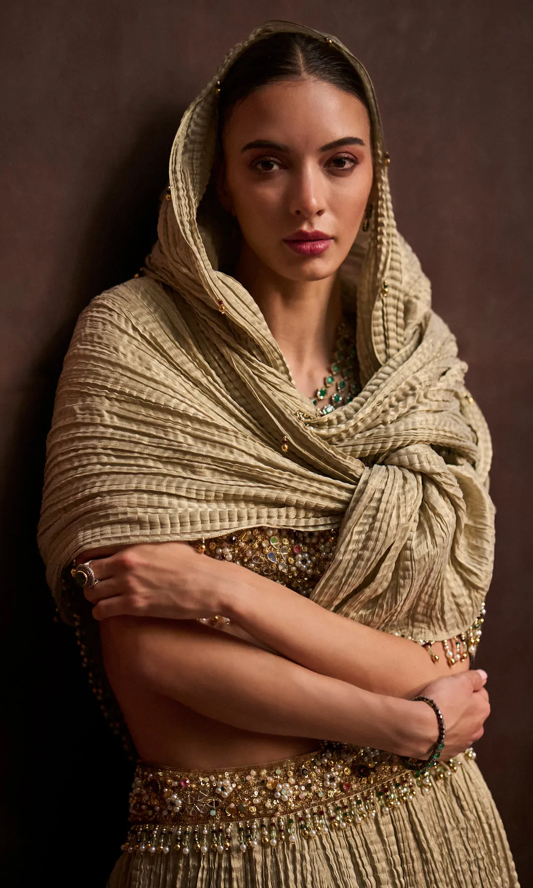 Antique Gold Pleated Lehenga with Heavily Embellished Blouse and Draped Dupatta