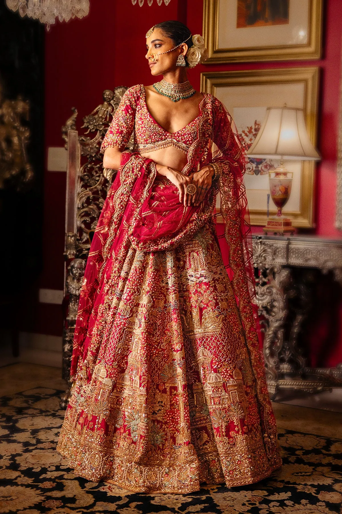  Crimson Red Bridal Lehenga with Intricate Gold Zardozi & Architectural Motif Embroidery