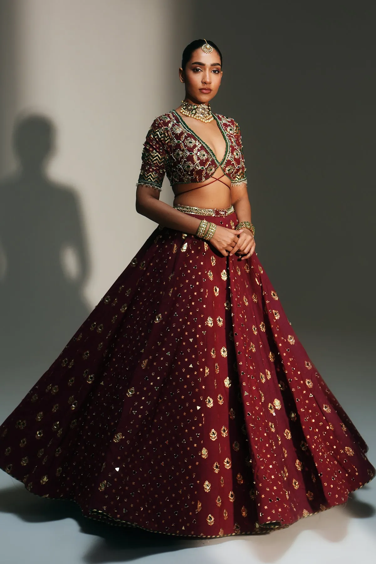 Deep Maroon Embellished Lehenga with Gold Buti Detailing