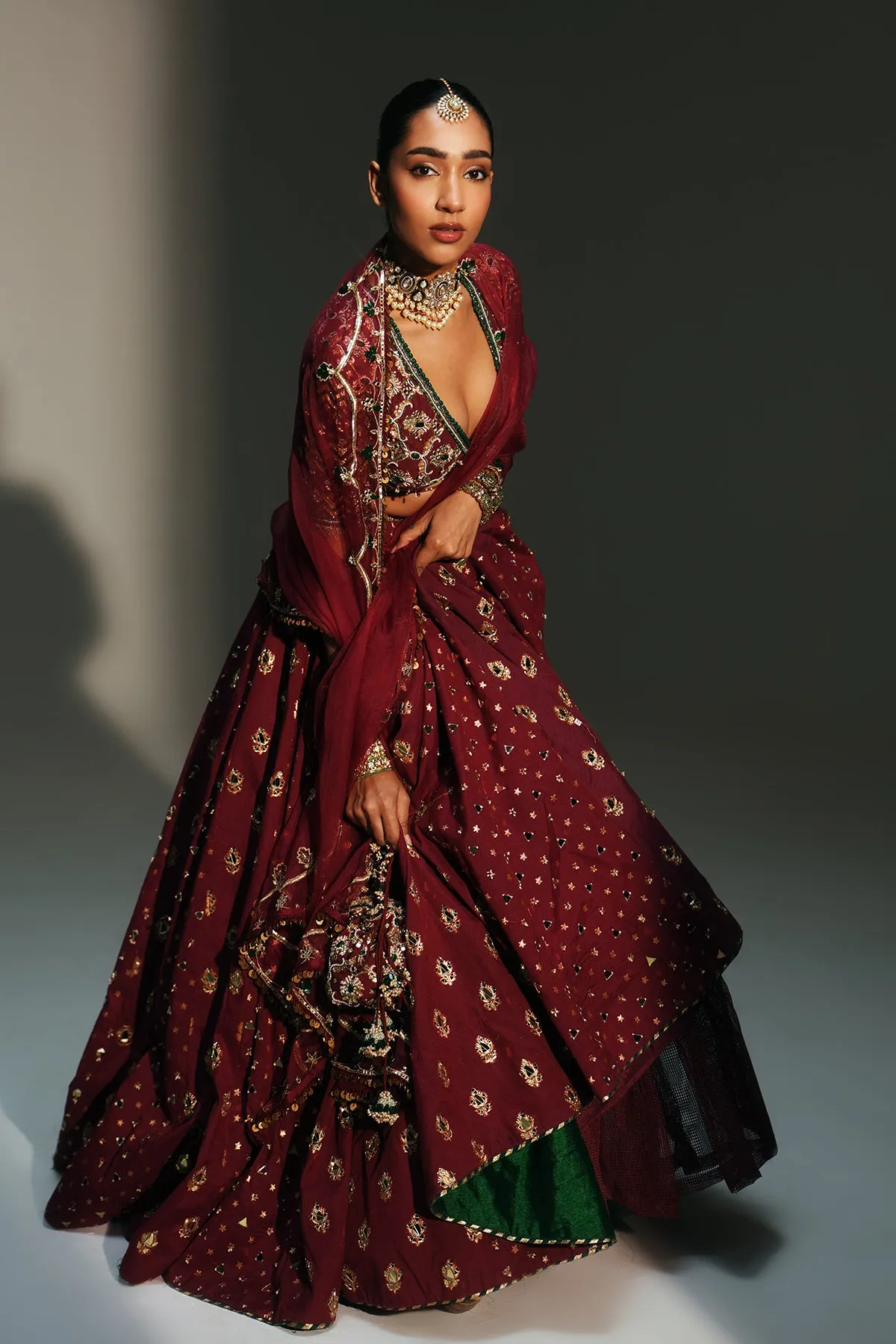 Deep Maroon Embellished Lehenga with Gold Buti Detailing